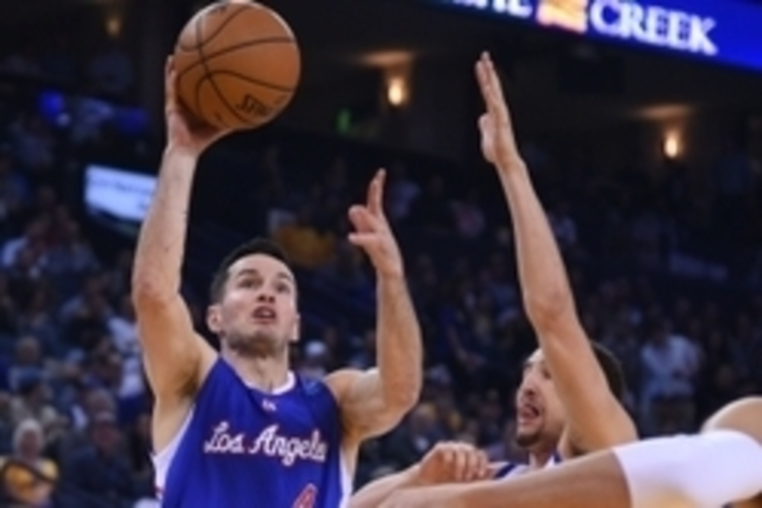 November 5, 2014; Oakland, CA, USA; Los Angeles Clippers guard J.J. Redick (4, left) shoots the basketball against Golden State Warriors guard Klay Thompson (11) during the first quarter at Oracle Arena. Mandatory Credit: Kyle Terada-USA TODAY Sports November 5, 2014; Oakland, CA, USA; Los Angeles Clippers guard J.J. Redick (4, left) shoots the basketball against Golden State Warriors guard Klay Thompson (11) during the first quarter at Oracle Arena. Mandatory Credit: Kyle Terada-USA TODAY Sports