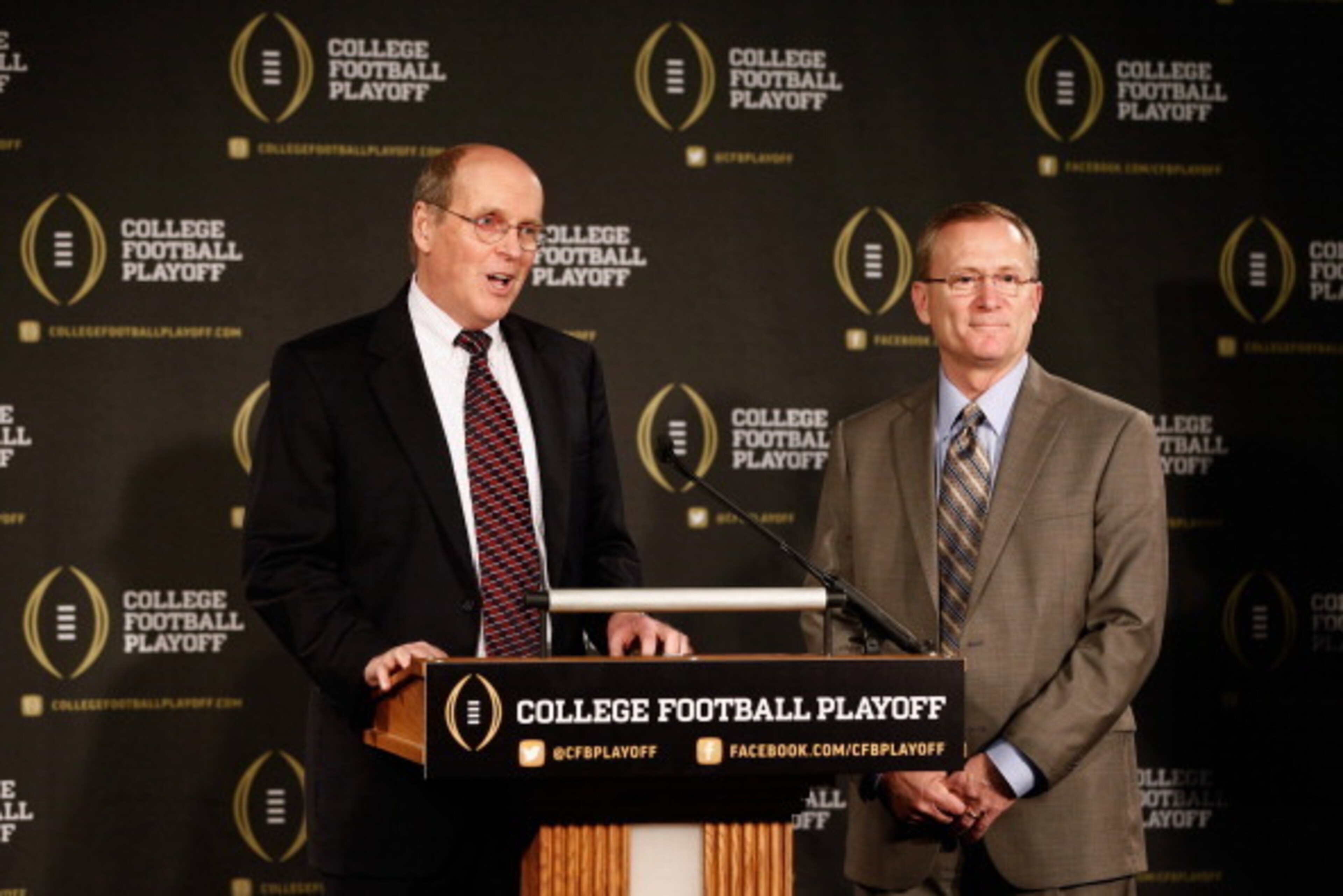 IRVING, TX - OCTOBER 16: (L-R) Bill Hancock, executive director of the College Football Playoff, introduces Jeff Long as the chairman of the College Football Playoff selection committee on October 16, 2013 in Irving, Texas. Long will serve as the chairma IRVING, TX - OCTOBER 16: (L-R) Bill Hancock, executive director of the College Football Playoff, introduces Jeff Long as the chairman of the College Football Playoff selection committee on October 16, 2013 in Irving, Texas. Long will serve as the chairma