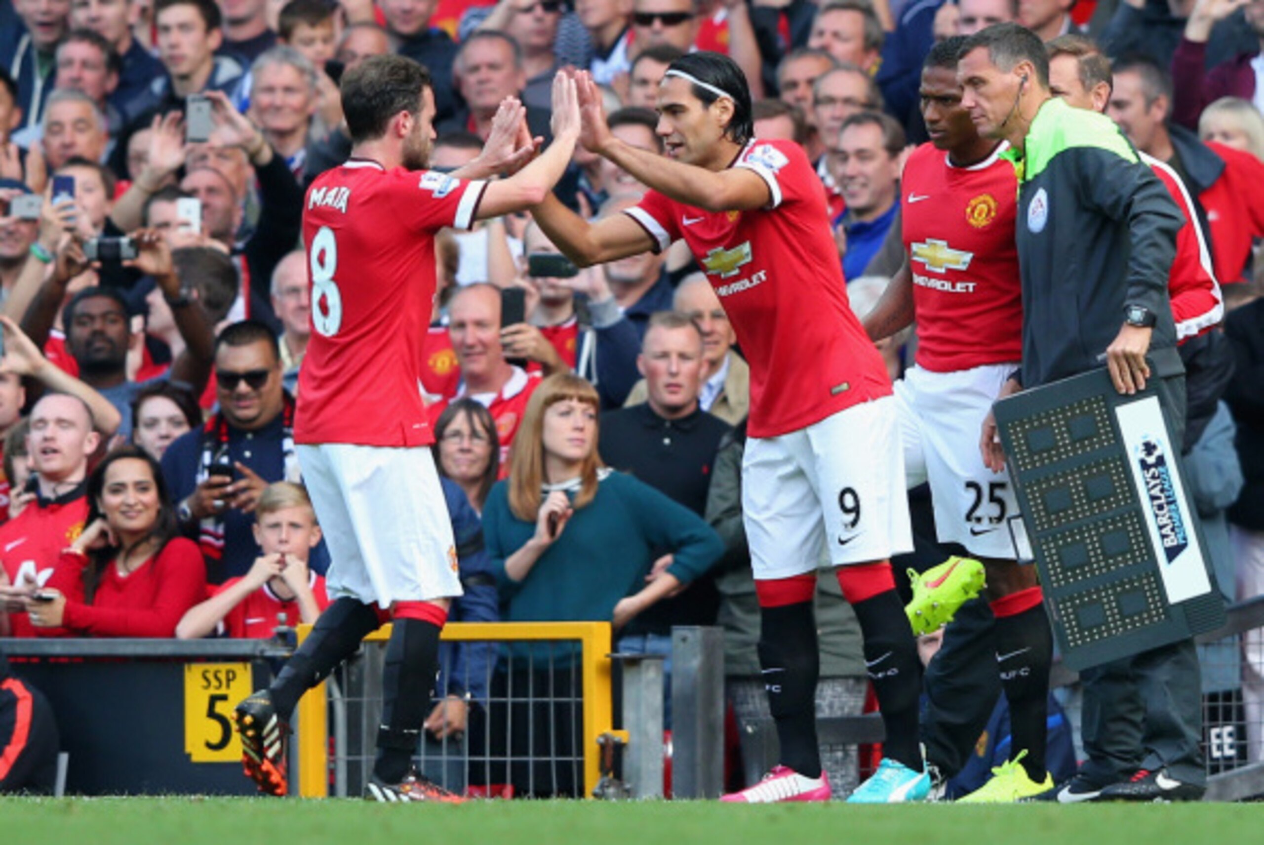MANCHESTER, ENGLAND - SEPTEMBER 14:  Radamel Falcao of Manchester United comes on as a substitute for Juan Mata to make his debut during the Barclays Premier League match between Manchester United and Queens Park Rangers at Old Trafford on September 14, 2