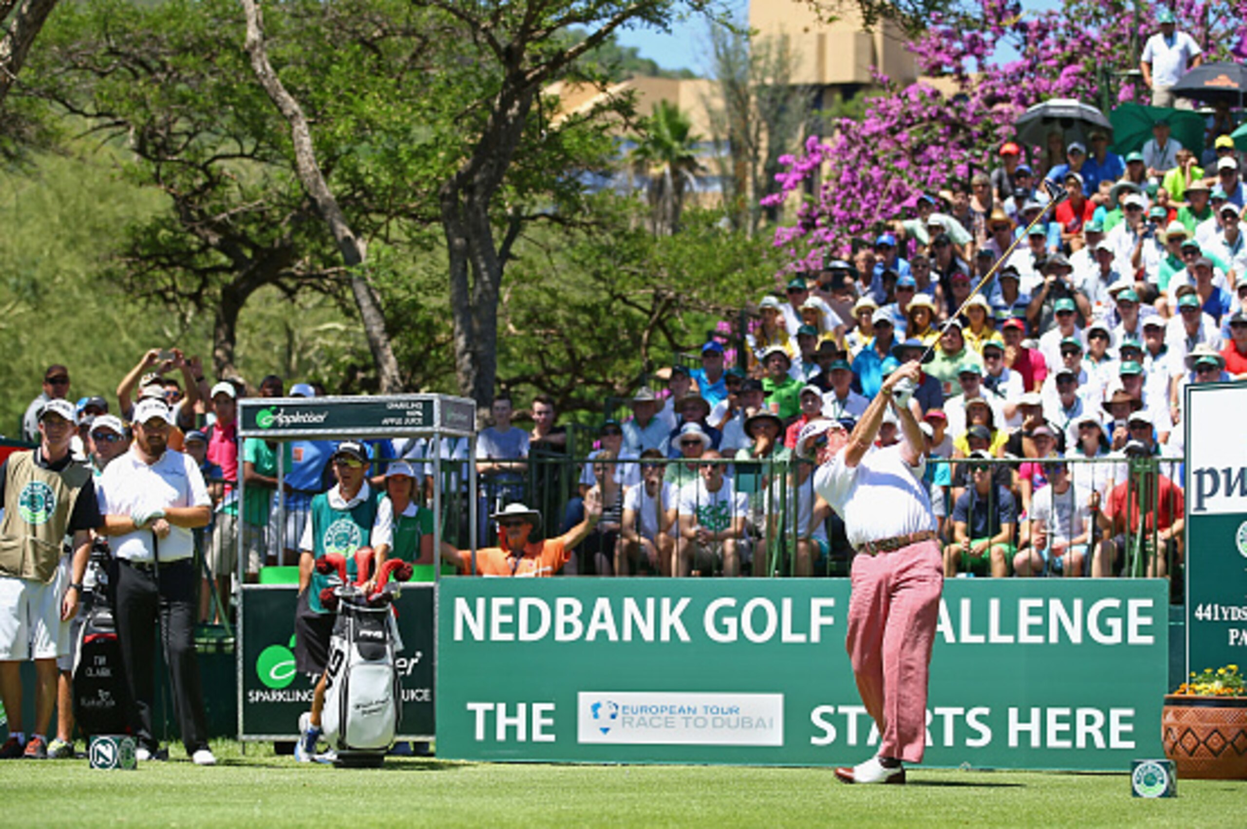 SUN CITY, SOUTH AFRICA - DECEMBER 04:  Miguel Angel Jimenez of Spain hits the inagural tee shot of the 2015 European Tour Race to Dubai during the first round of the Nedbank Golf Challenge at the Gary Player Country Club on December 4, 2014 in Sun City, S