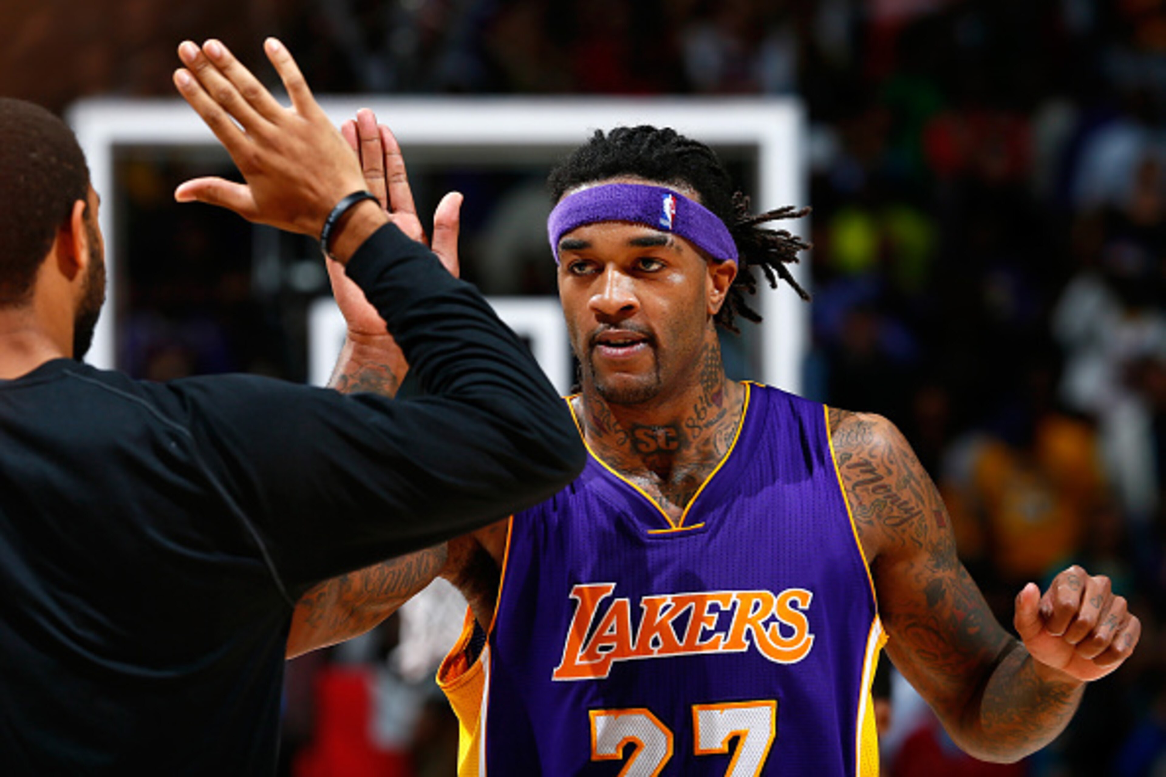 ATLANTA, GA - NOVEMBER 18: Jordan Hill #27 of the Los Angeles Lakers reacts after making a jumper and drawing a foul against the Atlanta Hawks at Philips Arena on November 18, 2014 in Atlanta, Georgia. NOTE TO USER: User expressly acknowledges and agree ATLANTA, GA - NOVEMBER 18: Jordan Hill #27 of the Los Angeles Lakers reacts after making a jumper and drawing a foul against the Atlanta Hawks at Philips Arena on November 18, 2014 in Atlanta, Georgia. NOTE TO USER: User expressly acknowledges and agree