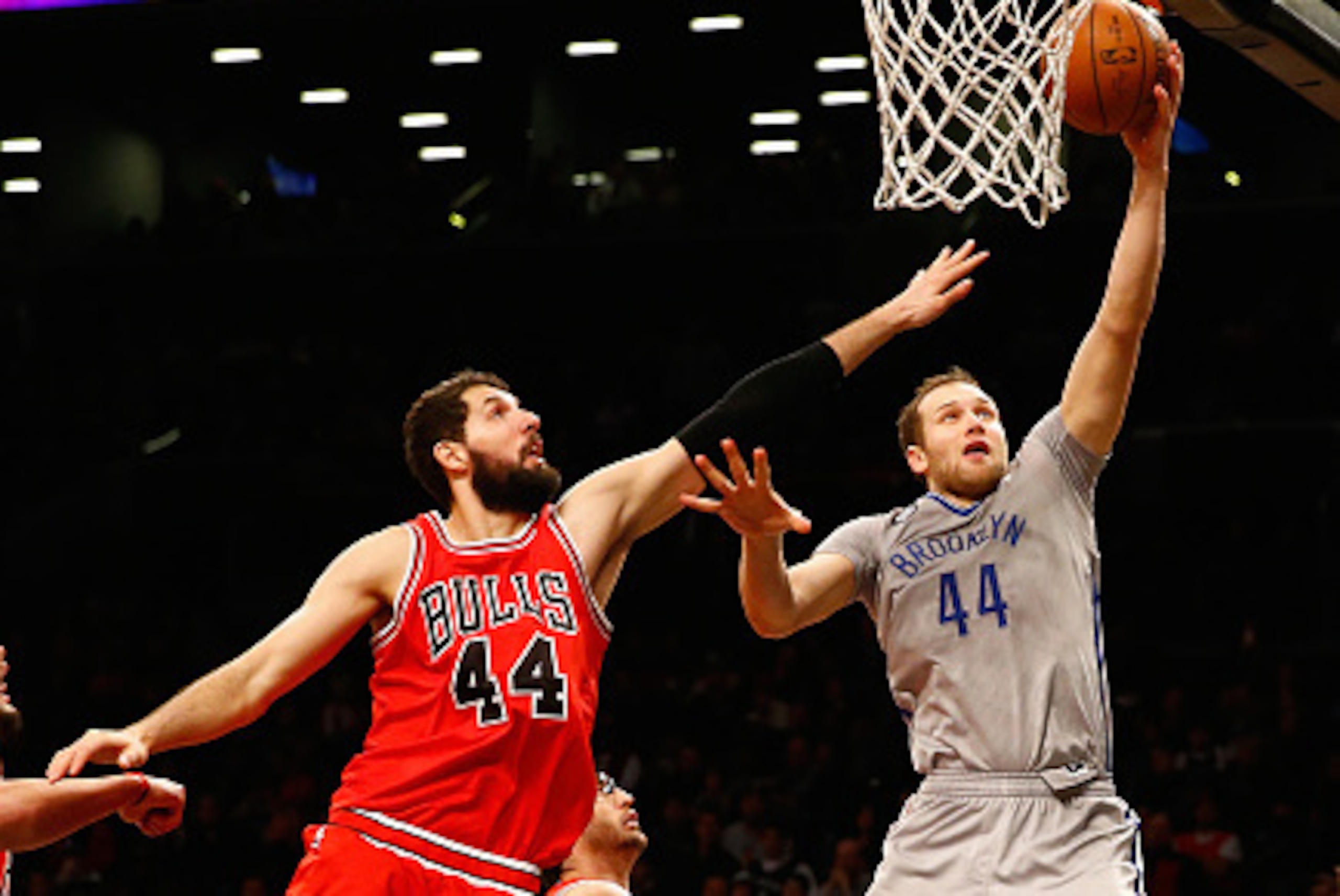 NEW YORK, NY - NOVEMBER 30: Nikola Mirotic #44 of the Chicago Bulls defends against Bojan Bogdanovic #44 of the Brooklyn Nets  during their game at the Barclays Center on November 30, 2014 in New York City.  (Photo by Al Bello/Getty Images)