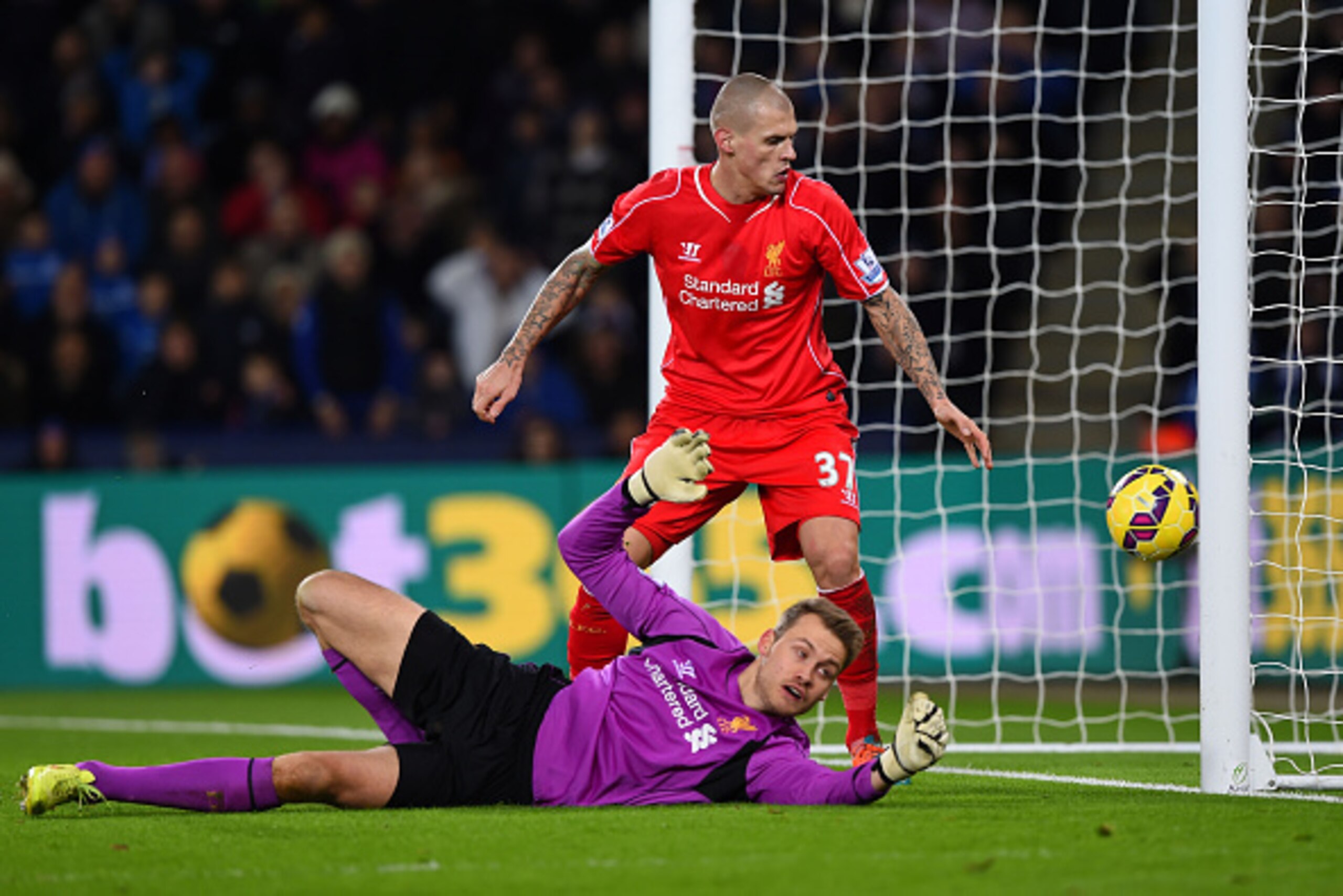 LEICESTER, ENGLAND - DECEMBER 02:  Martin Skrtel of Liverpool looks on as Simon Mignolet of Liverpool scores an own goal during the Barclays Premier League match between Leicester City and Liverpool at The King Power Stadium on December 2, 2014 in Leicest