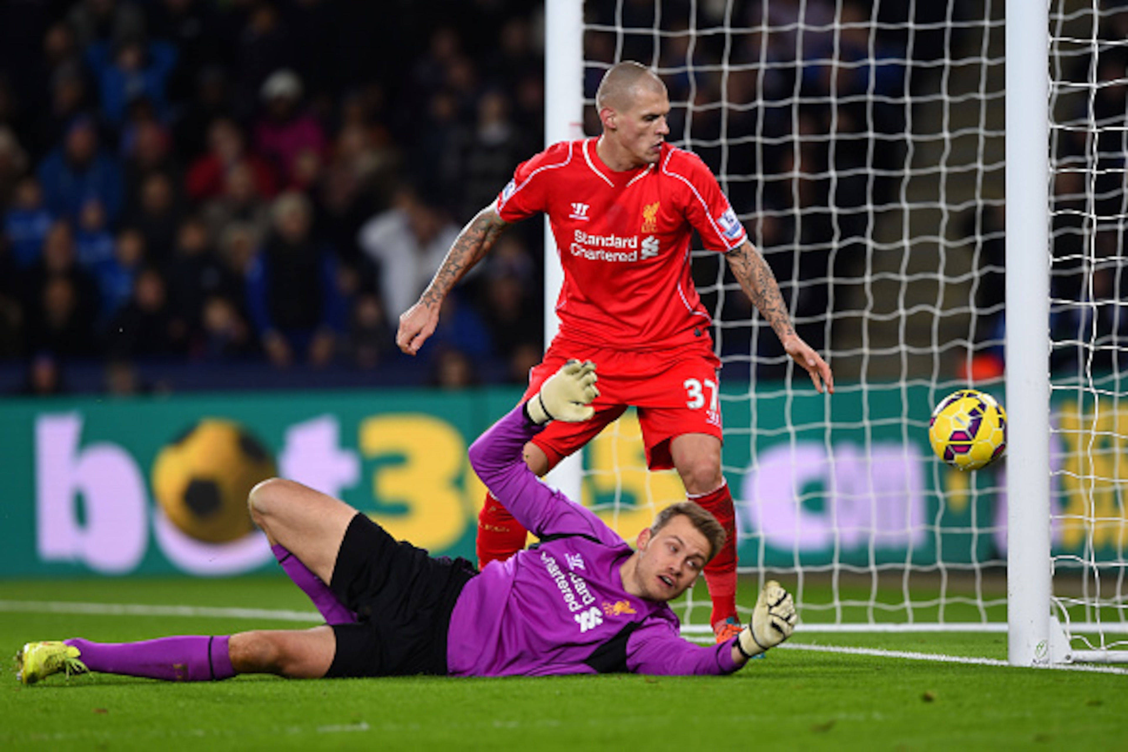 LEICESTER, ENGLAND - DECEMBER 02:  Martin Skrtel of Liverpool looks on as Simon Mignolet of Liverpool scores an own goal during the Barclays Premier League match between Leicester City and Liverpool at The King Power Stadium on December 2, 2014 in Leicest