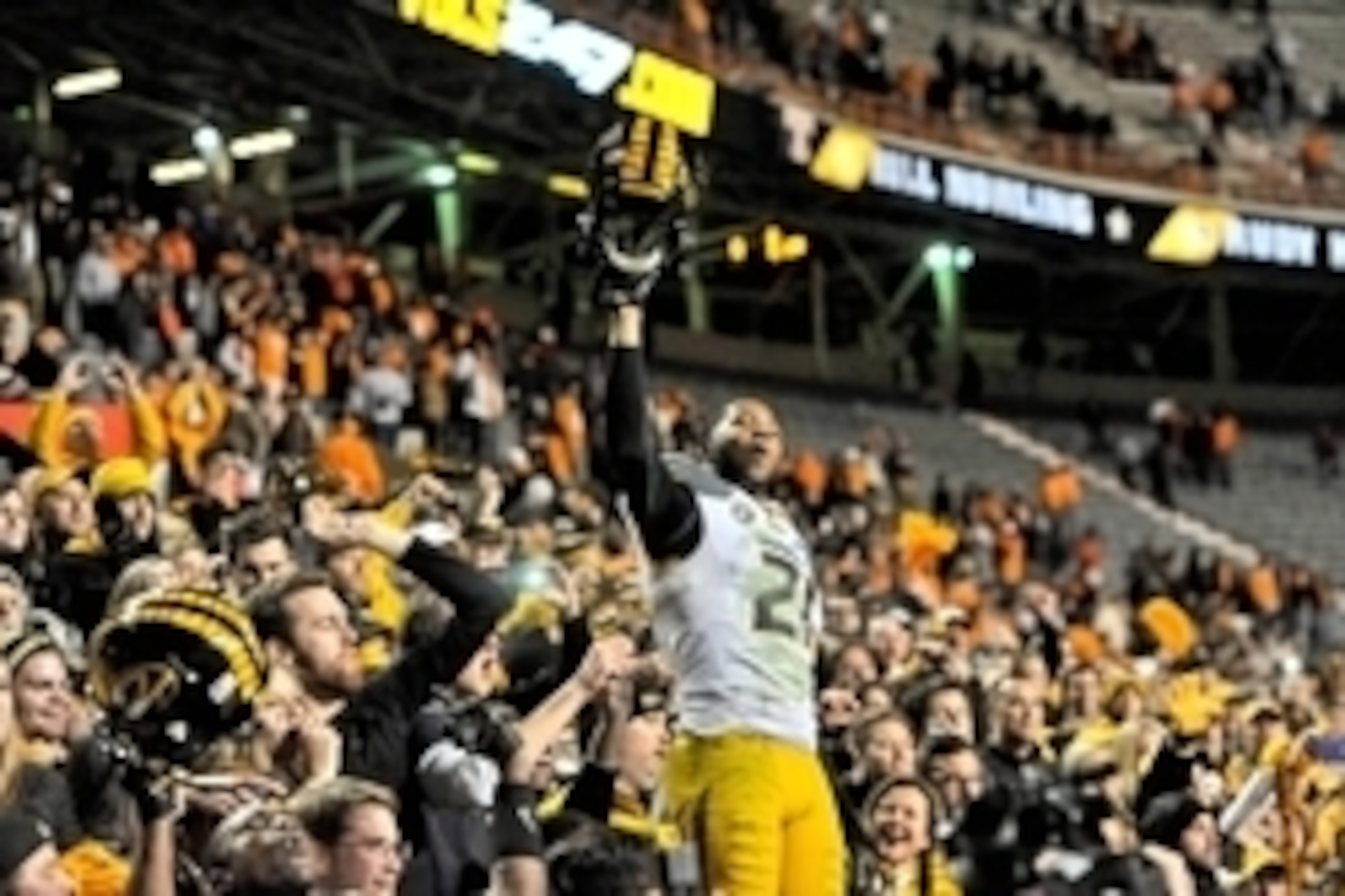 Nov 22, 2014; Knoxville, TN, USA; Missouri Tigers wide receiver Bud Sasser (21) celebrates with fans after his team defeated the Tennessee Volunteers during the second half at Neyland Stadium. Missouri won 29-21. Mandatory Credit: Jim Brown-USA TODAY Spo Nov 22, 2014; Knoxville, TN, USA; Missouri Tigers wide receiver Bud Sasser (21) celebrates with fans after his team defeated the Tennessee Volunteers during the second half at Neyland Stadium. Missouri won 29-21. Mandatory Credit: Jim Brown-USA TODAY Spo