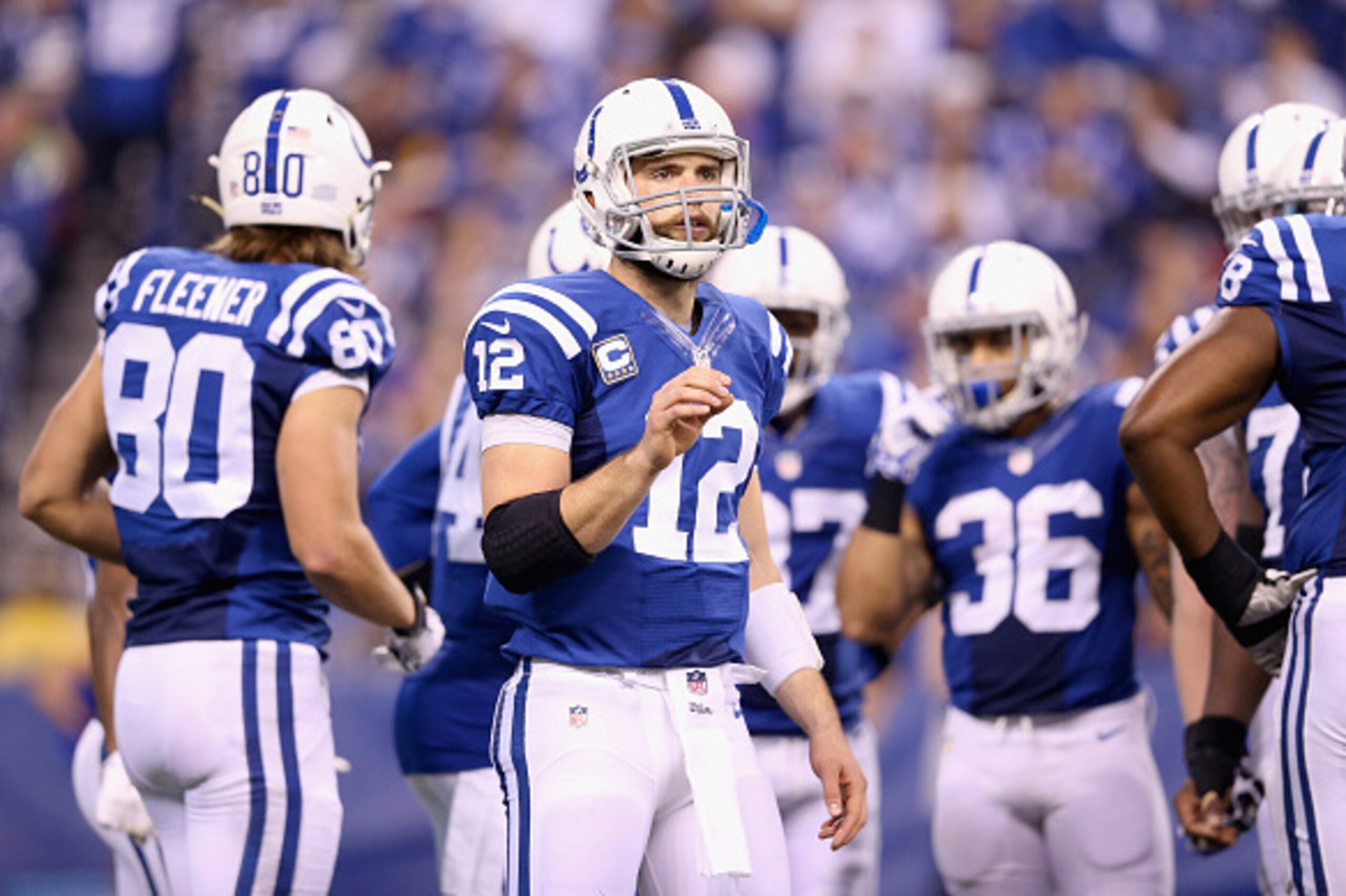 INDIANAPOLIS, IN - NOVEMBER 30:  Andrew Luck #12 of the Indianapolis Colts looks to the bench during the game against the Washington Redskins at Lucas Oil Stadium on November 30, 2014 in Indianapolis, Indiana.  (Photo by Andy Lyons/Getty Images)