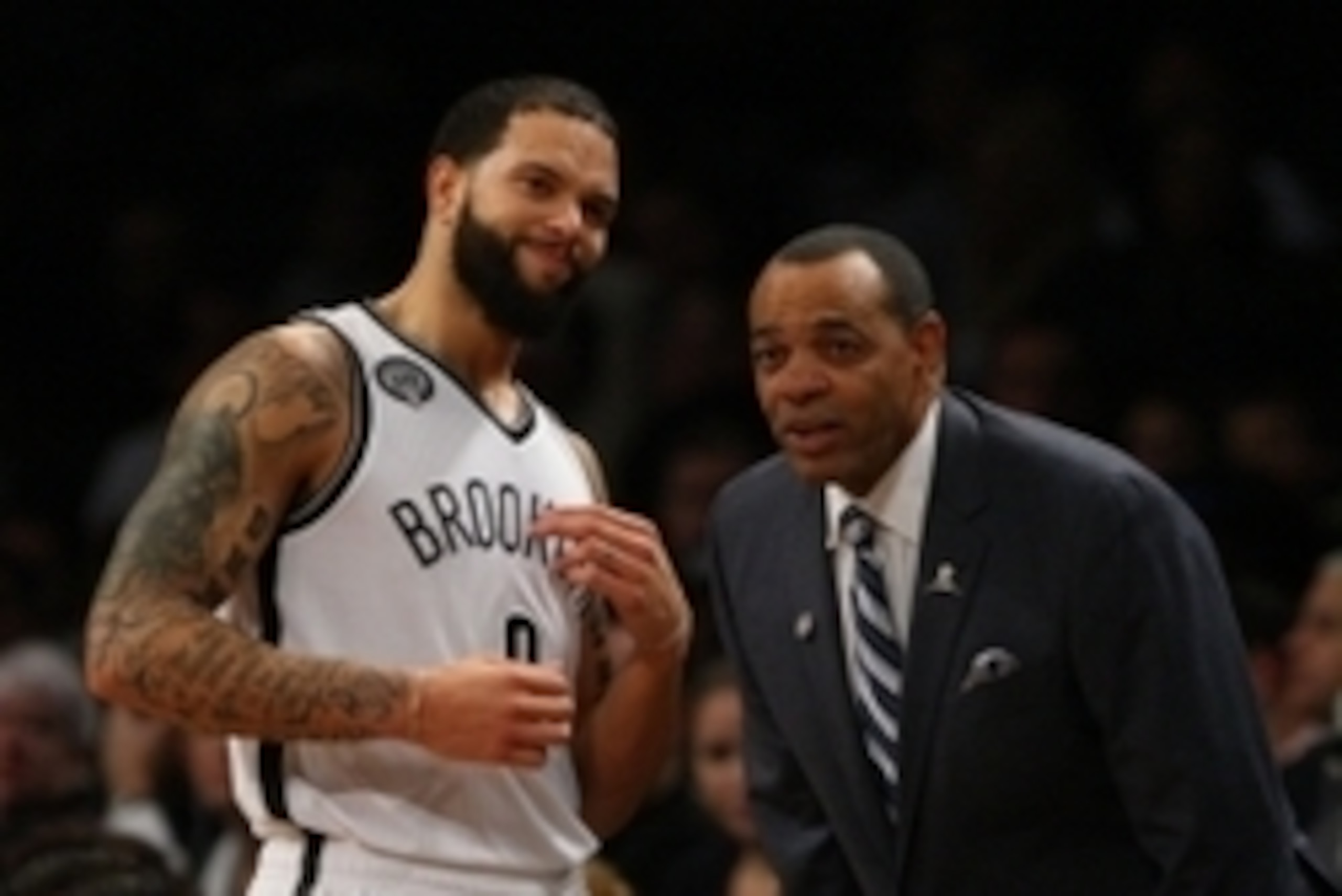 Nov 19, 2014; Brooklyn, NY, USA;  Brooklyn Nets guard Deron Williams (8) and Brooklyn Nets head coach Lionel Hollins during first half against the Milwaukee Bucks at Barclays Center. Mandatory Credit: Noah K. Murray-USA TODAY Sports