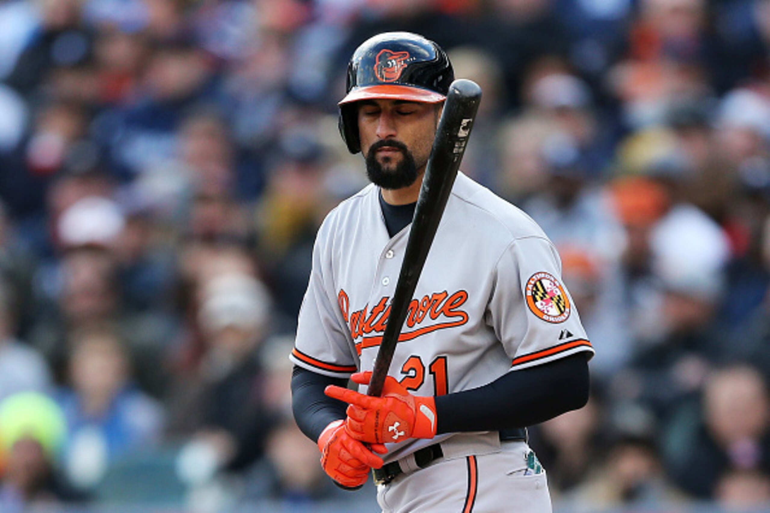 DETROIT, MI - OCTOBER 05:  Nick Markakis #21 of the Baltimore Orioles reacts as he strikes out to end the top of the fifth inning against the Detroit Tigers during Game Three of the American League Division Series at Comerica Park on October 5, 2014 in De