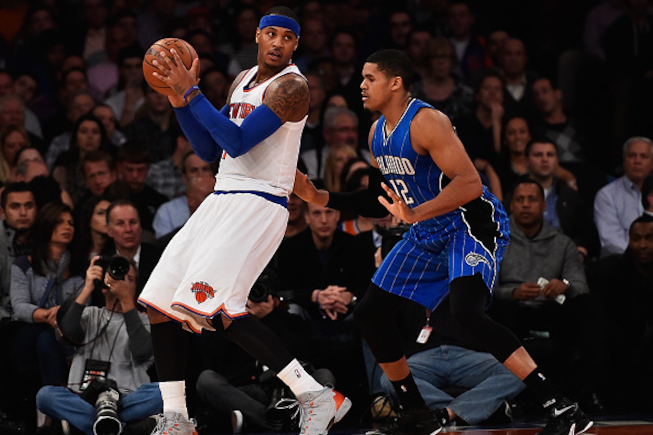 NEW YORK, NY - NOVEMBER 12:  Carmelo Anthony #7 of the New York Knicks dribbles against Tobias Harris #12 of the Orlando Magic during their game at Madison Square Garden on November 12, 2014 in New York City.  (Photo by Al Bello/Getty Images)