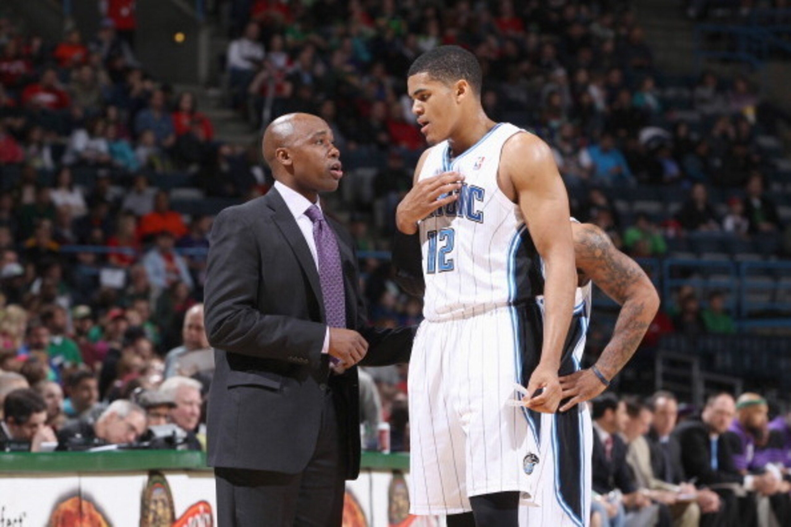 MILWAUKEE, WI - MARCH 17: Tobias Harris #12 and Head Coach Jacque Vaughn of the Orlando Magic speak on court during the game against the Milwaukee Bucks on March 17, 2013 at the BMO Harris Bradley Center in Milwaukee, Wisconsin. NOTE TO USER:  User expres