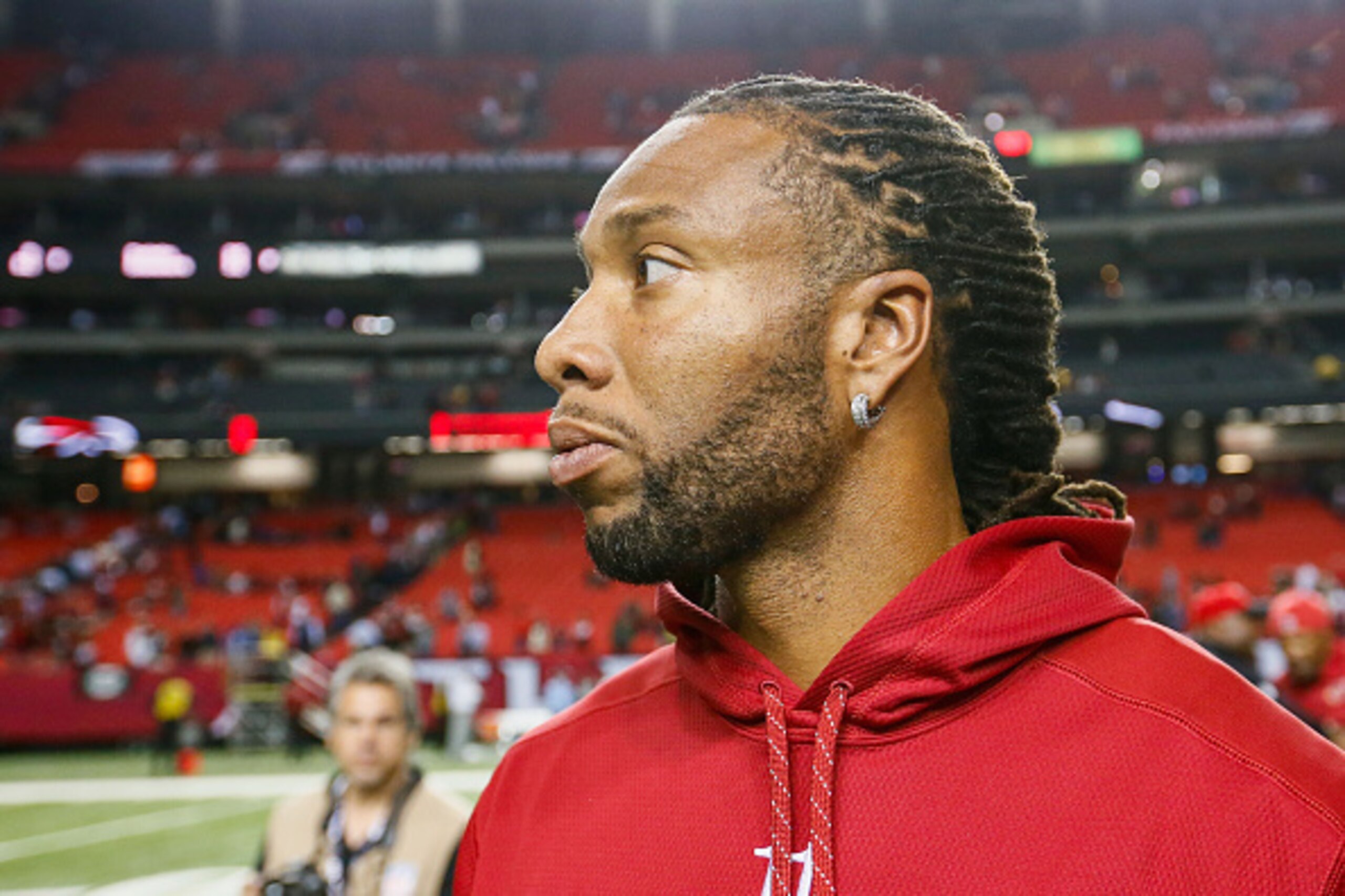 ATLANTA, GA - NOVEMBER 30: Larry Fitzgerald #11 of the Arizona Cardinals stands on the field after the game against the Atlanta Falcons at the Georgia Dome on November 30, 2014 in Atlanta, Georgia. The Falcons won 29-18.  (Photo by Kevin C. Cox/Getty Imag