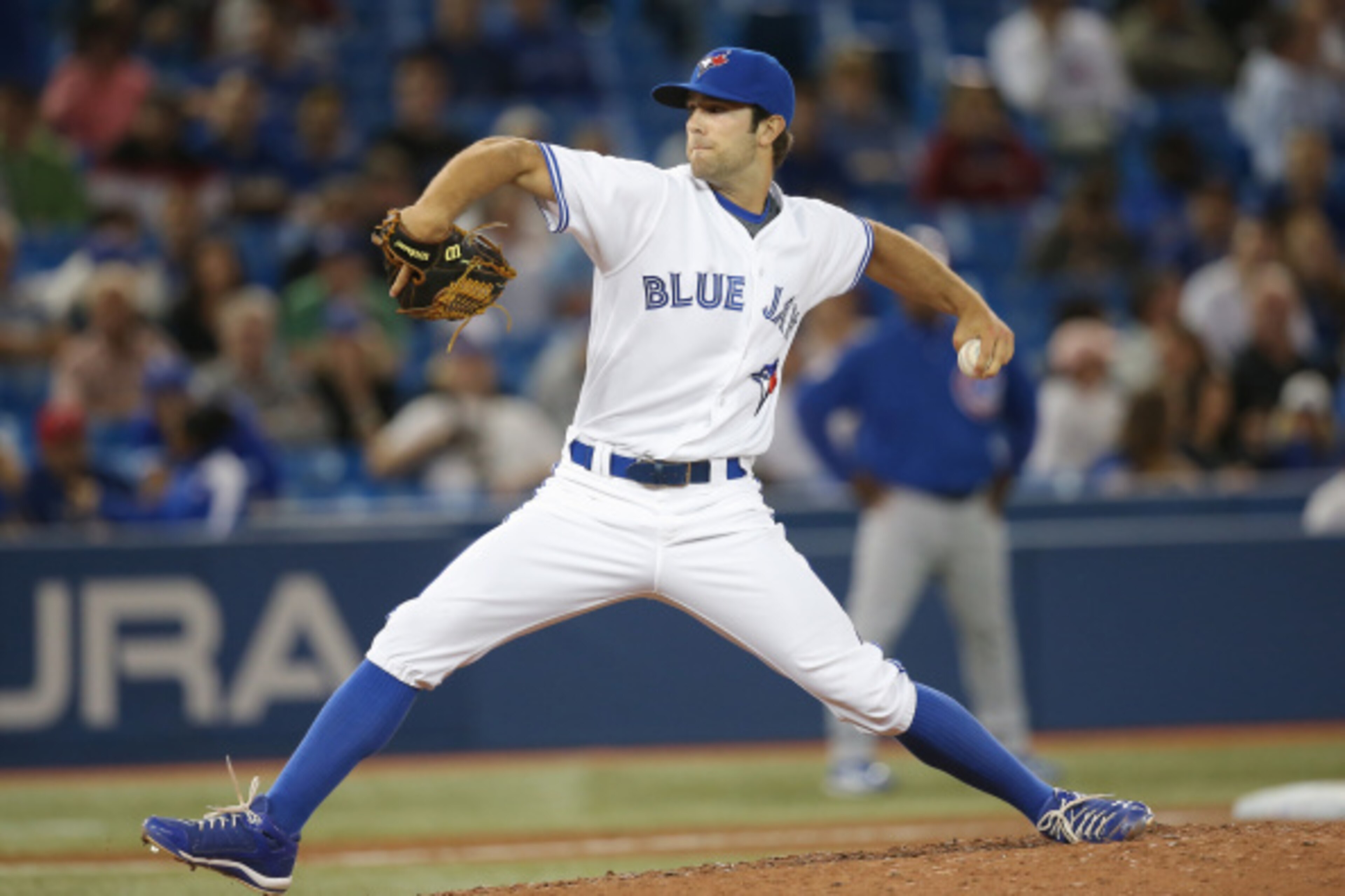 TORONTO, CANADA - SEPTEMBER 9: Daniel Norris #32 of the Toronto Blue Jays delivers a pitch in the ninth inning during MLB game action against the Chicago Cubs on September 9, 2014 at Rogers Centre in Toronto, Ontario, Canada. (Photo by Tom Szczerbowski/Ge
