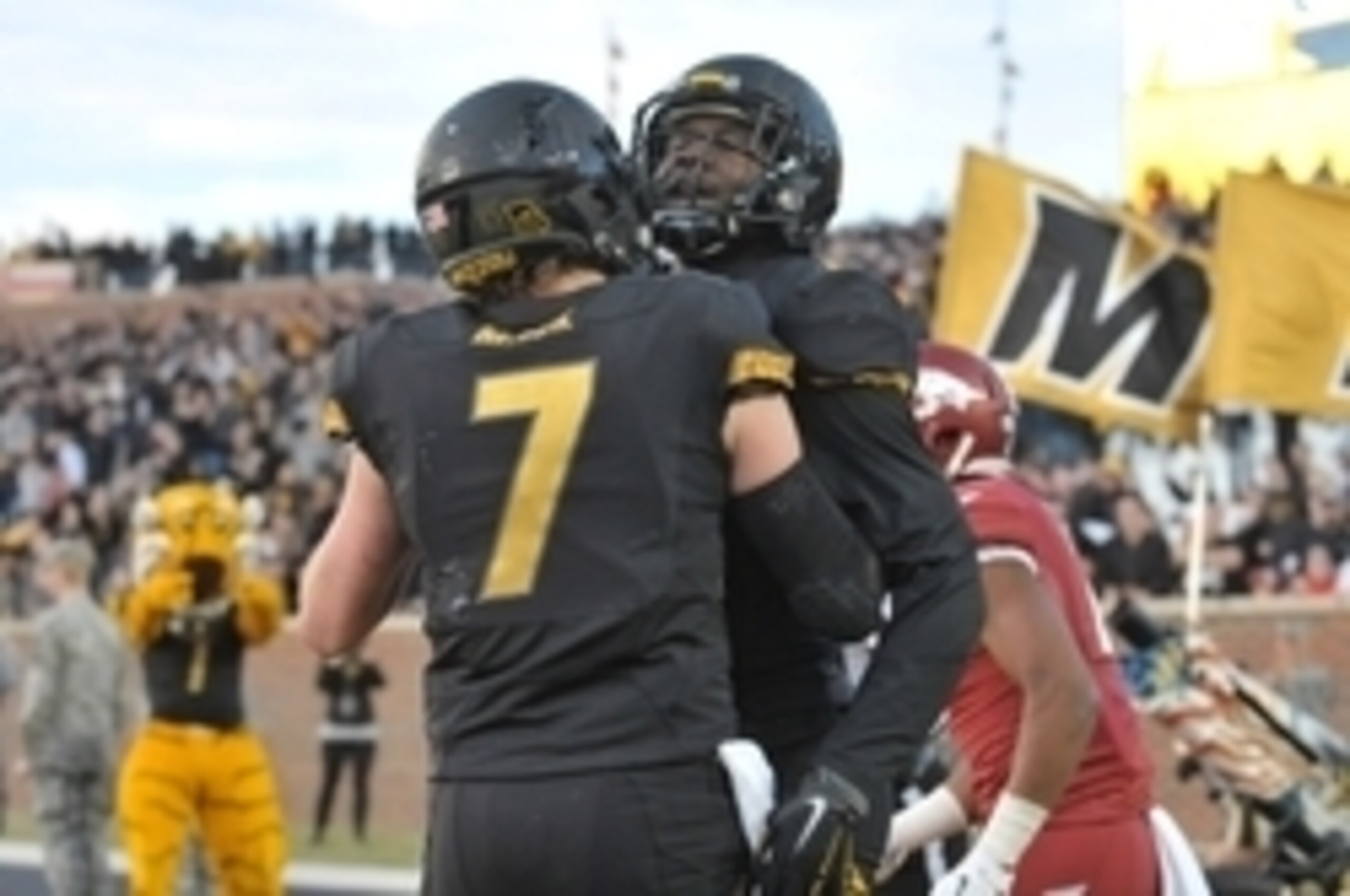 Nov 28, 2014; Columbia, MO, USA; Missouri Tigers wide receiver Darius White (8) is congratulated by quarterback Maty Mauk (7) after White's two point conversion catch during the second half against the Arkansas Razorbacks at Faurot Field. Missouri won 21- Nov 28, 2014; Columbia, MO, USA; Missouri Tigers wide receiver Darius White (8) is congratulated by quarterback Maty Mauk (7) after White's two point conversion catch during the second half against the Arkansas Razorbacks at Faurot Field. Missouri won 21-