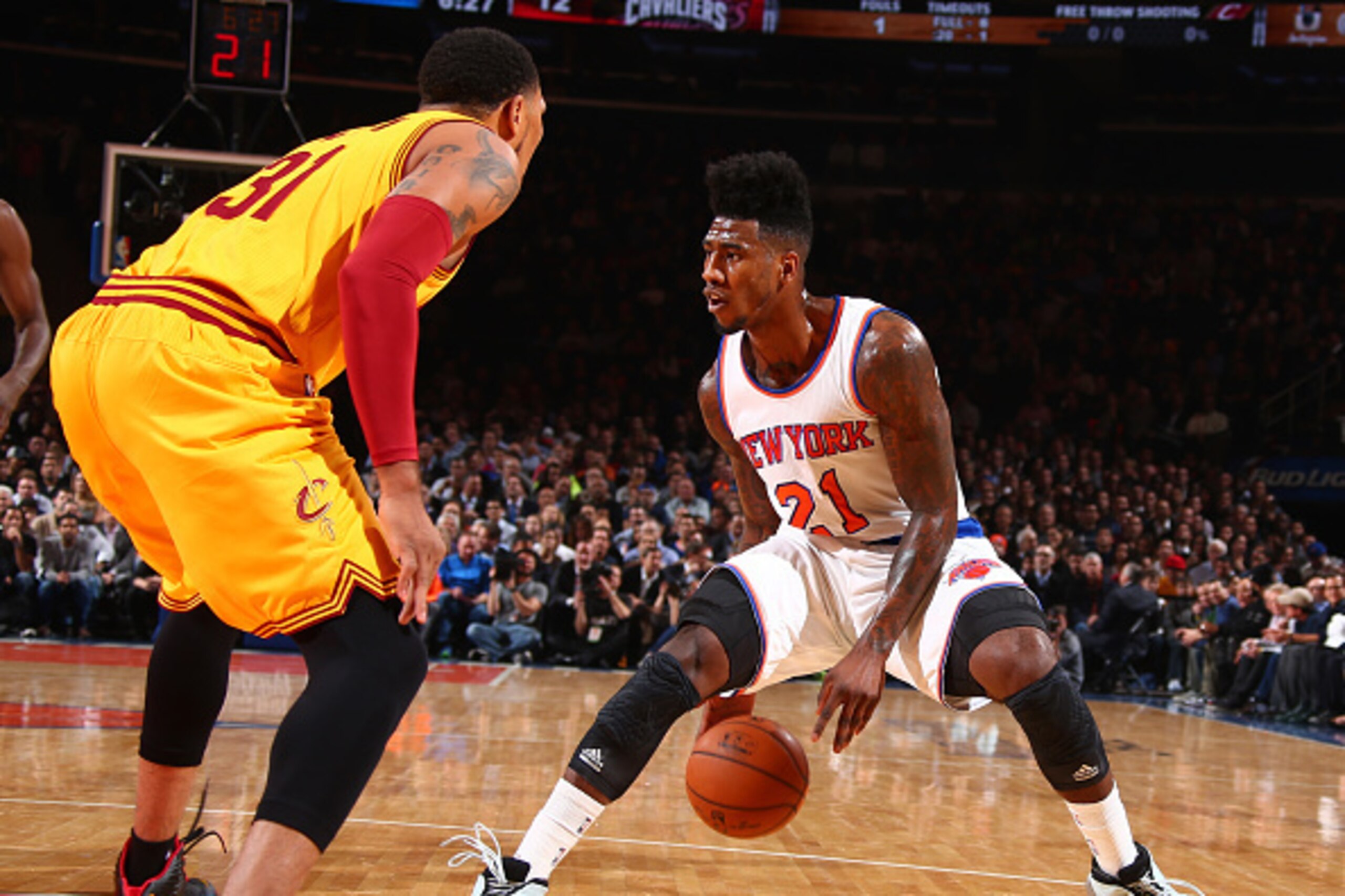 NEW YORK, NY - DECEMBER 4: Iman Shumpert #21 of the New York Knicks handles the ball against the Cleveland at Madison Square Garden in New York City, New York on December 4, 2014.  NOTE TO USER: User expressly acknowledges and agrees that, by downloading 