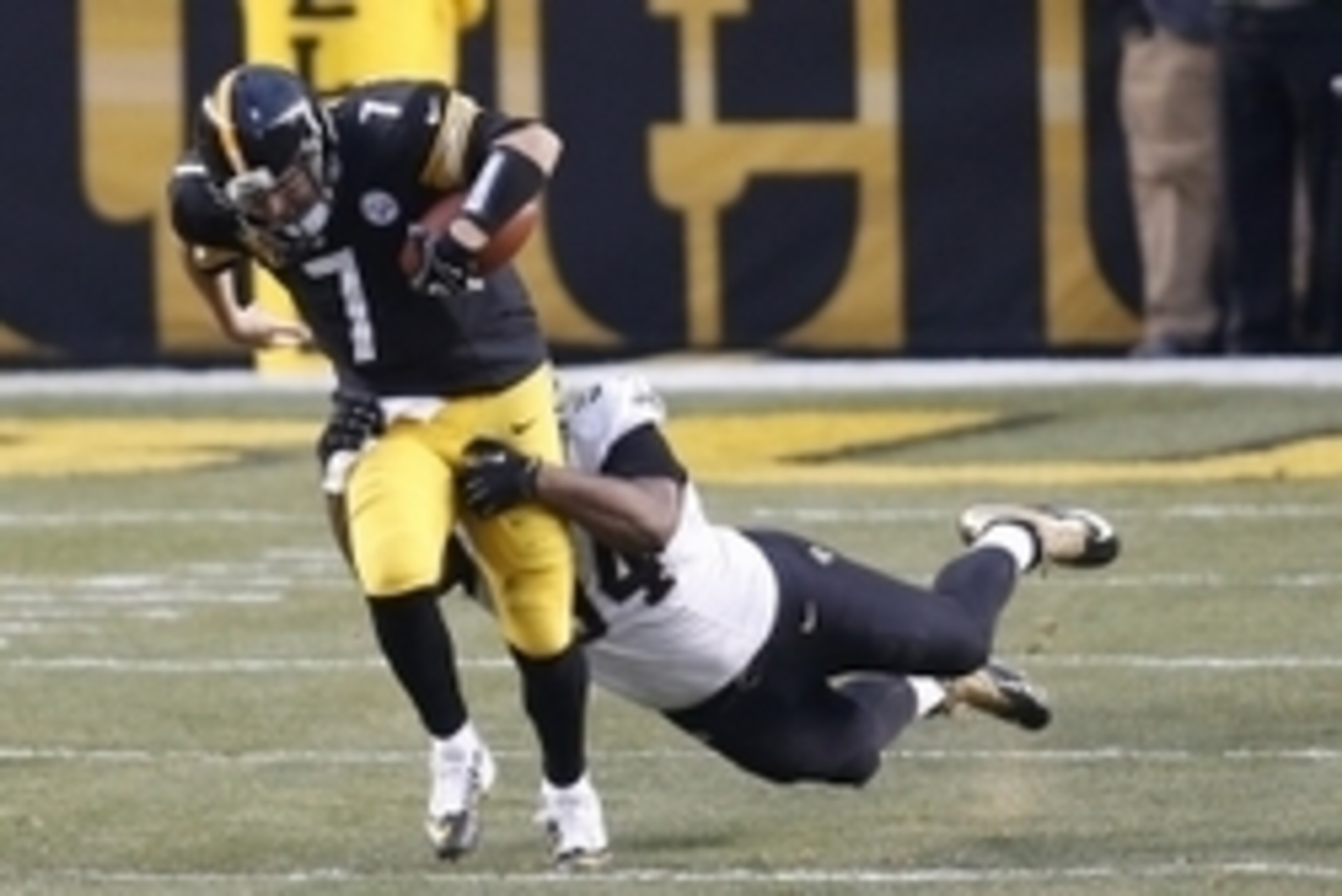 Nov 30, 2014; Pittsburgh, PA, USA; Pittsburgh Steelers quarterback Ben Roethlisberger (7) is sacked by New Orleans Saints defensive end Cameron Jordan (right) during the fourth quarter at Heinz Field. The Saints won 35-32. Mandatory Credit: Charles LeClai