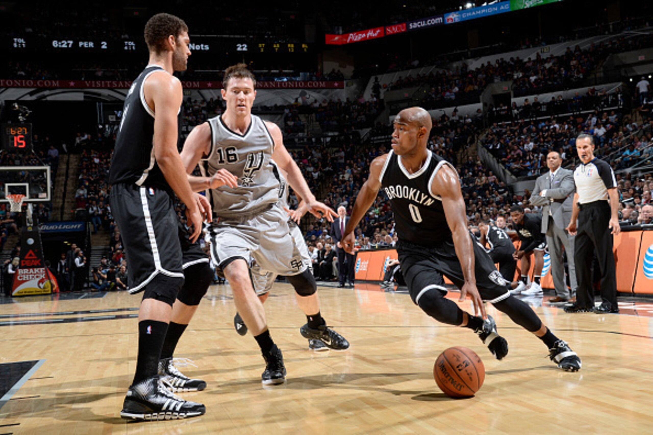 SAN ANTONIO, TX - NOVEMBER 22:  Jarrett Jack #0 of the Brooklyn Nets handles the ball against the San Antonio Spurs at the AT&T Center on November 22, 2014 in San Antonio, Texas. NOTE TO USER: User expressly acknowledges and agrees that, by downloading an