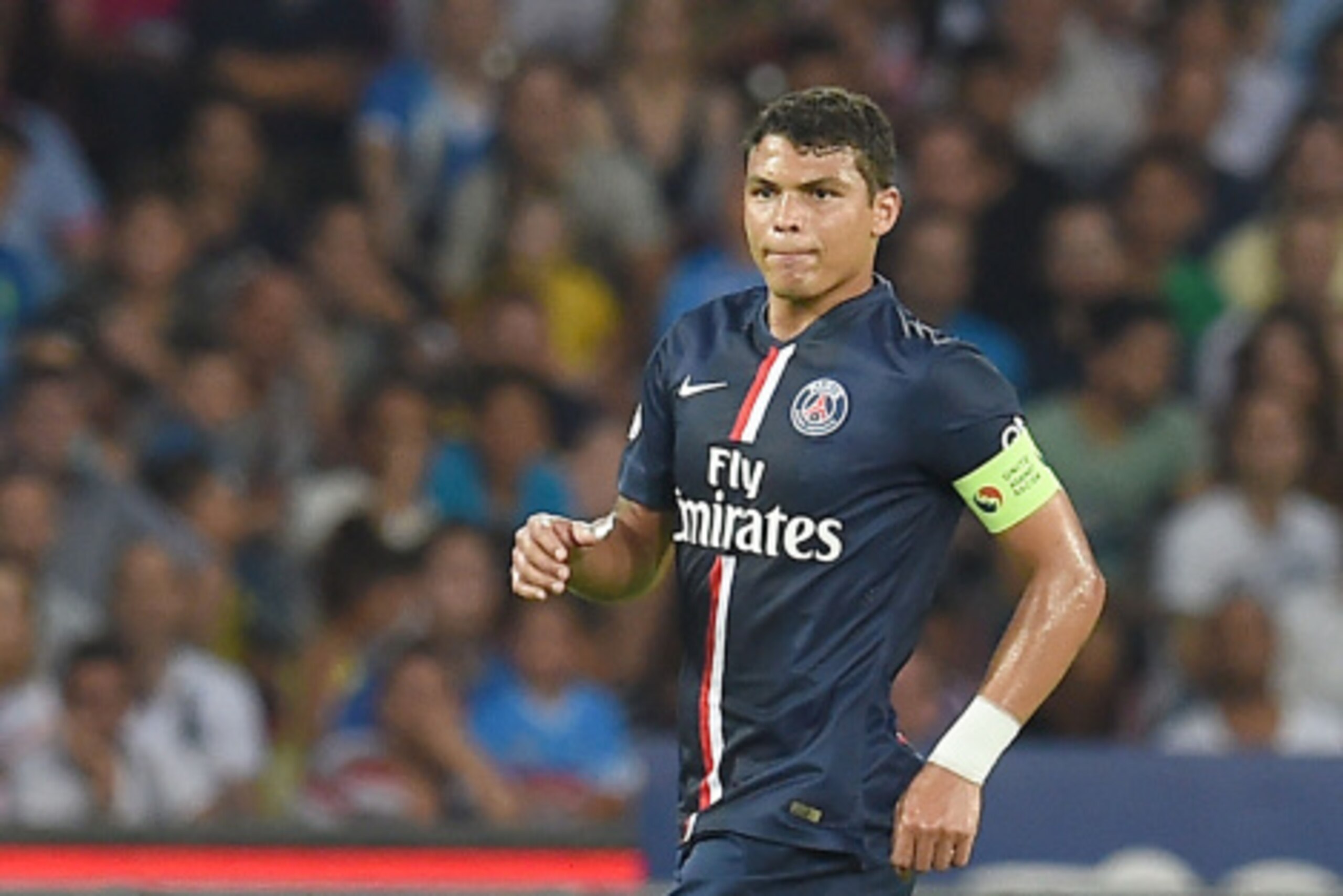 NAPLES, ITALY - AUGUST 11:  Thiago Silva of Paris Saint Germain  in action during the pre-season friendly match between SSC Napoli and Paris Saint-Germain FC at Stadio San Paolo on August 11, 2014 in Naples, Italy.  (Photo by Giuseppe Bellini/Getty Images