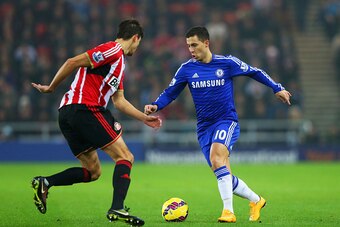 SUNDERLAND, ENGLAND - NOVEMBER 29:  Eden Hazard of Chelsea takes on Santiago Vergini of Sunderland during the Barclays Premier League match between Sunderland and Chelsea at Stadium of Light on November 29, 2014 in Sunderland, England.  (Photo by Alex Liv