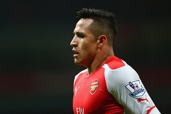LONDON, ENGLAND - DECEMBER 03: Alexis Sanchez of Arsenal  during the Barclays Premier League match between Arsenal and Southampton at the Emirates Stadium on December 3, 2014 in London, England.  (Photo by Michael Steele/Getty Images)