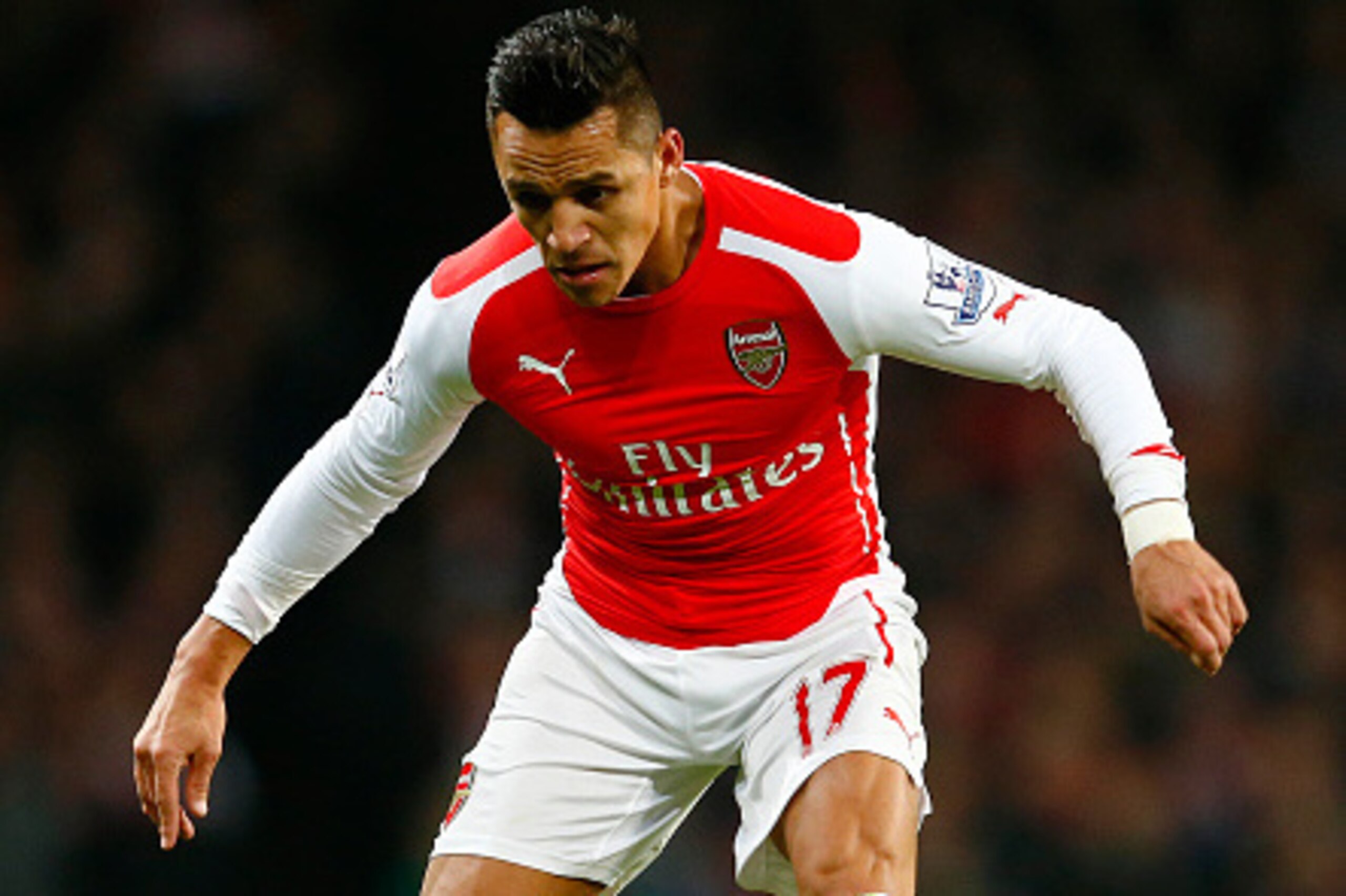 LONDON, ENGLAND - DECEMBER 03: Alexis Sanchez of Arsenal runs with the ball during the Barclays Premier League match between Arsenal and Southampton at Emirates Stadium on December 3, 2014 in London, England. (Photo by Julian Finney/Getty Images) LONDON, ENGLAND - DECEMBER 03: Alexis Sanchez of Arsenal runs with the ball during the Barclays Premier League match between Arsenal and Southampton at Emirates Stadium on December 3, 2014 in London, England. (Photo by Julian Finney/Getty Images)