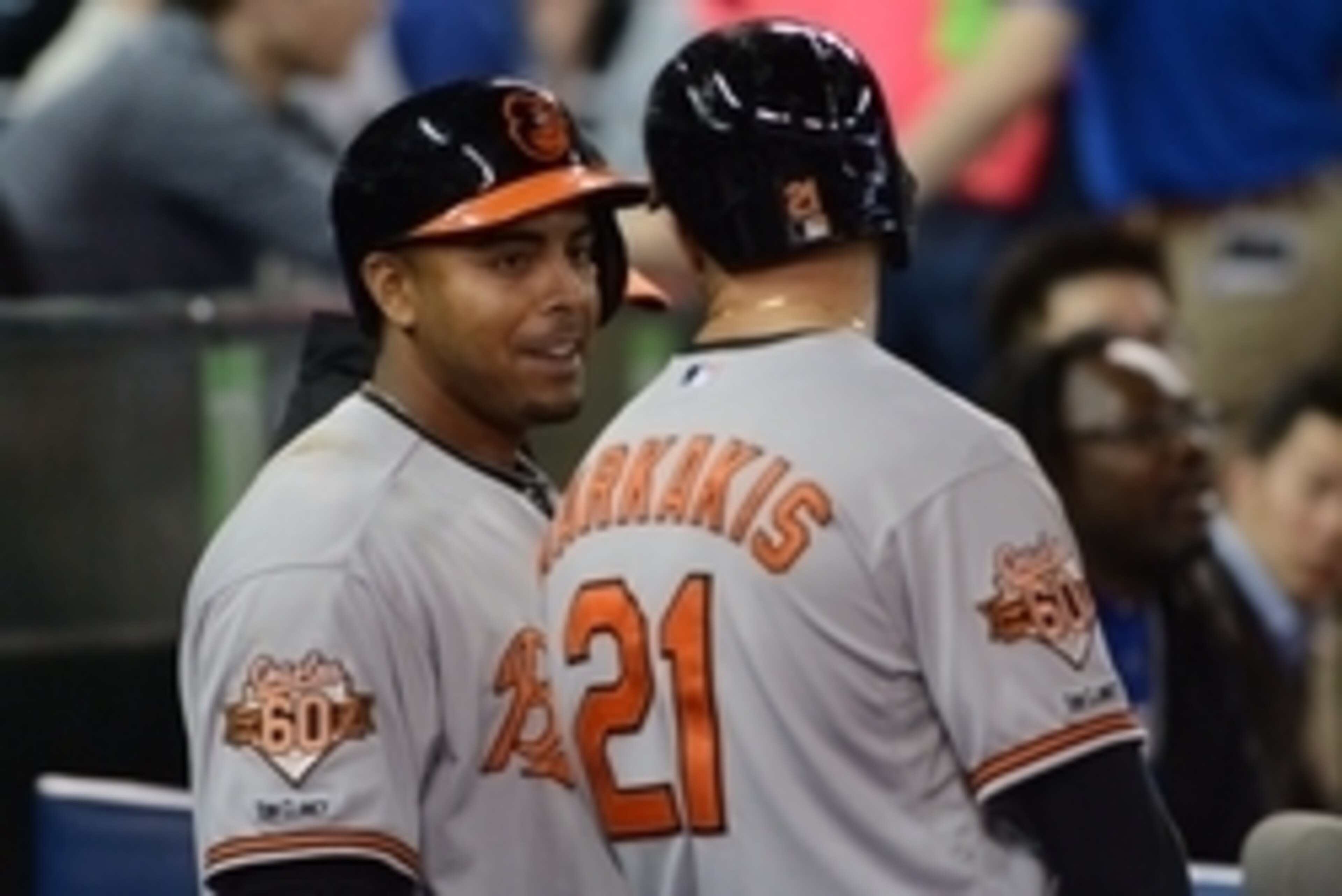 Apr 23, 2014; Toronto, Ontario, CAN;  Baltimore Orioles designated hitter Nelson Cruz (23) talks with right fielder Nick Markakis (21) during Wednesday's 10-8 win over Toronto Blue Jays at Rogers Centre. Mandatory Credit: Dan Hamilton-USA TODAY Sports