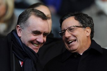 LIVERPOOL, ENGLAND - NOVEMBER 17:  Liverpool chairman Tom Werner (R) chats with managing director Ian Ayre prior to the Barclays Premier League match between Liverpool and Wigan Athletic at Anfield on November 17, 2012 in Liverpool, England.  (Photo by Ch