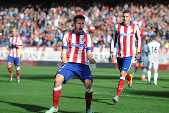 MADRID, SPAIN - NOVEMBER 30:  Saul Diges of Club Atletico de Madrid celebrates after scoring his team's opening goal during the La Liga match between Club Atletico de Madrid and RC Deportivo La Coruna at Vicente Calderon Stadium on November 30, 2014 in Ma