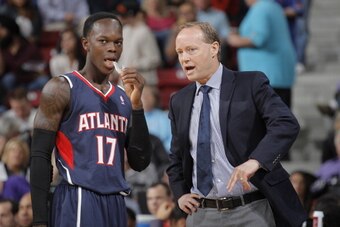 SACRAMENTO, CA - NOVEMBER 5: Head Coach Mike Budenholzer of the Atlanta Hawks talks to his player, Dennis Schroder #17 during a game against the Sacramento Kings on November 5, 2013 at Sleep Train Arena in Sacramento, California. NOTE TO USER: User expres