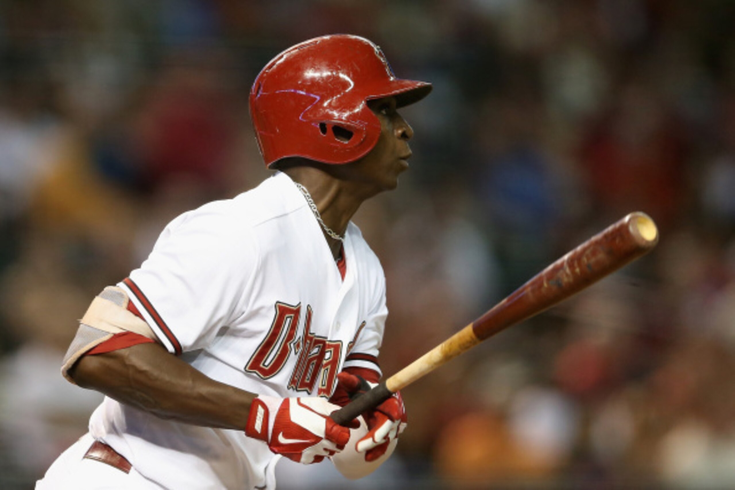 PHOENIX, AZ - AUGUST 26:  Didi Gregorius #1 of the Arizona Diamondbacks hits a single against the Los Angeles Dodgers during the second inning of the MLB game at Chase Field on August 26, 2014 in Phoenix, Arizona.  (Photo by Christian Petersen/Getty Image