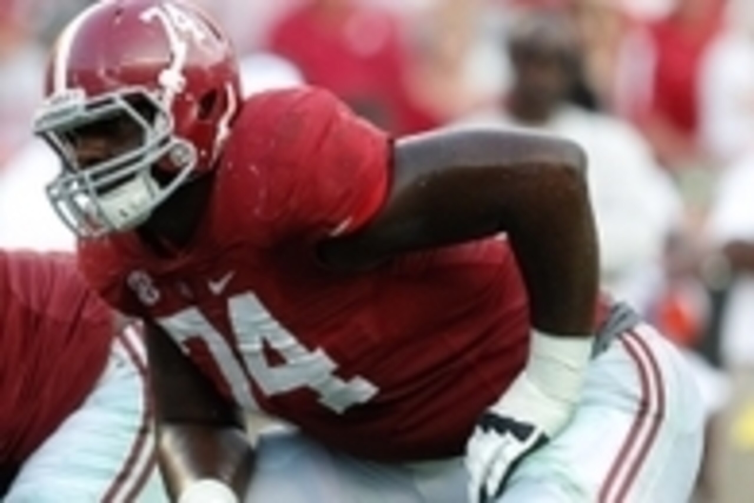 Sep 20, 2014; Tuscaloosa, AL, USA; Alabama Crimson Tide offensive lineman Cam Robinson (74) lines up against Florida Gators at Bryant-Denny Stadium. Mandatory Credit: Marvin Gentry-USA TODAY Sports