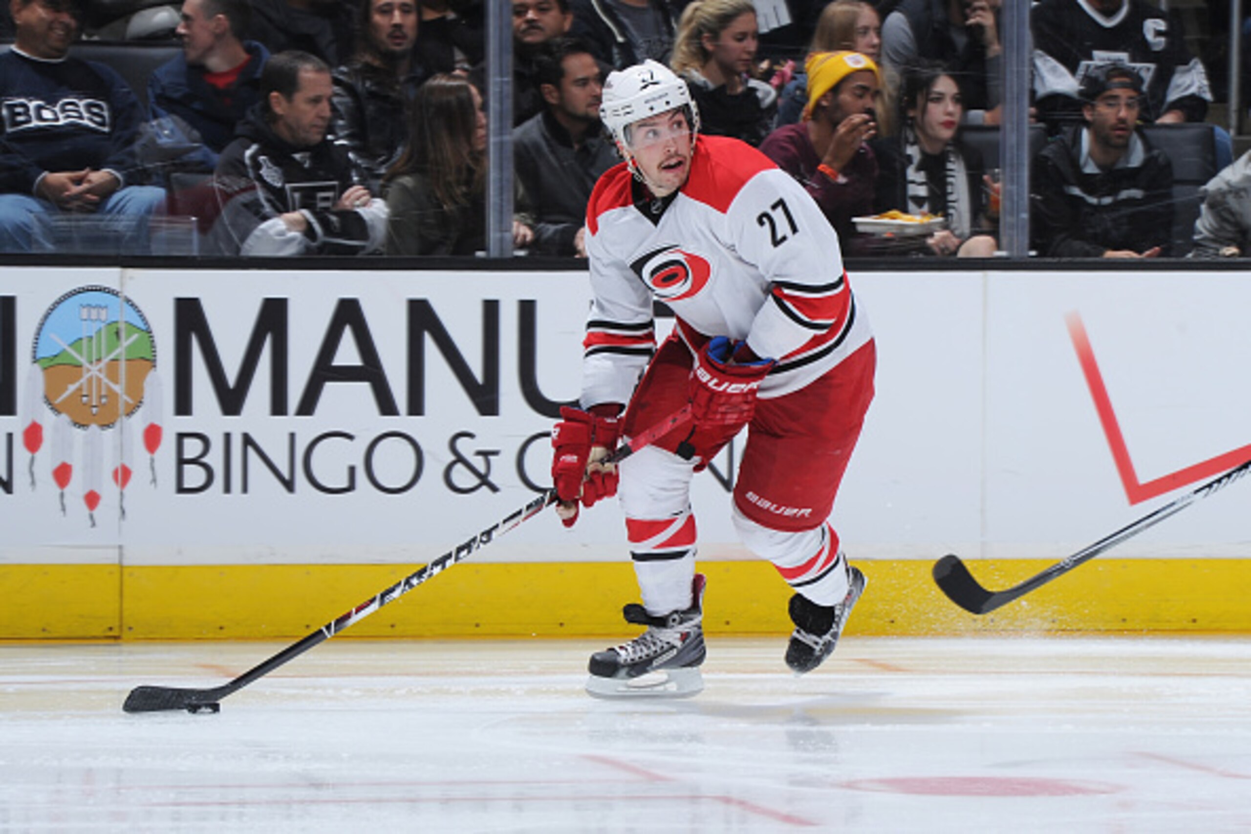 LOS ANGELES, CA - NOVEMBER 20: Justin Faulk #27 of the Carolina Hurricanes handles the puck during a game against the Los Angeles Kings at STAPLES Center on November 20, 2014 in Los Angeles, California. (Photo by Andrew D. Bernstein/NHLI via Getty Images)