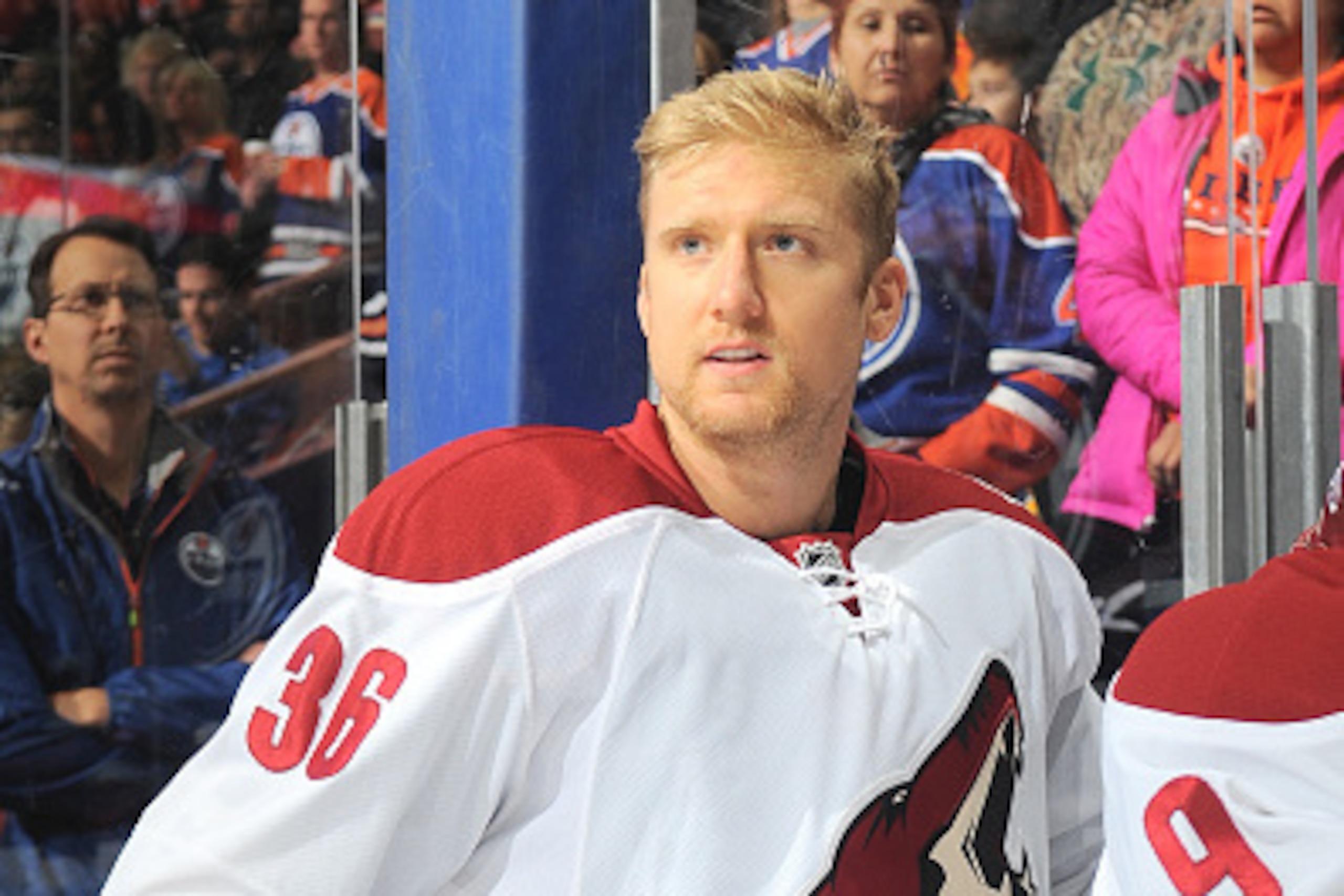 EDMONTON, AB - NOVEMBER 16: Rob Klinkhammer #36 of the Arizona Coyotes stands for the singing of the national anthem prior to the game against the Edmonton Oilers on November 16, 2014 at Rexall Place in Edmonton, Alberta, Canada. (Photo by Andy Devlin/NHL