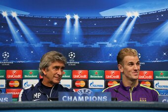 MANCHESTER, ENGLAND - SEPTEMBER 29:  Manuel Pellegrini the manager of Manchester City and Joe Hart face the media during a press conference at the Etihad Stadium on September 29, 2014 in Manchester, England.  (Photo by Alex Livesey/Getty Images)