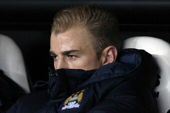 NEWCASTLE, UNITED KINGDOM - OCTOBER 30:  Goalkeeper Joe Hart of  Manchester City sits on the bench during the Capital One Cup Fourth Round match between Newcastle United and Manchester City at St James' Park on October 30, 2013 in Newcastle upon Tyne, Eng