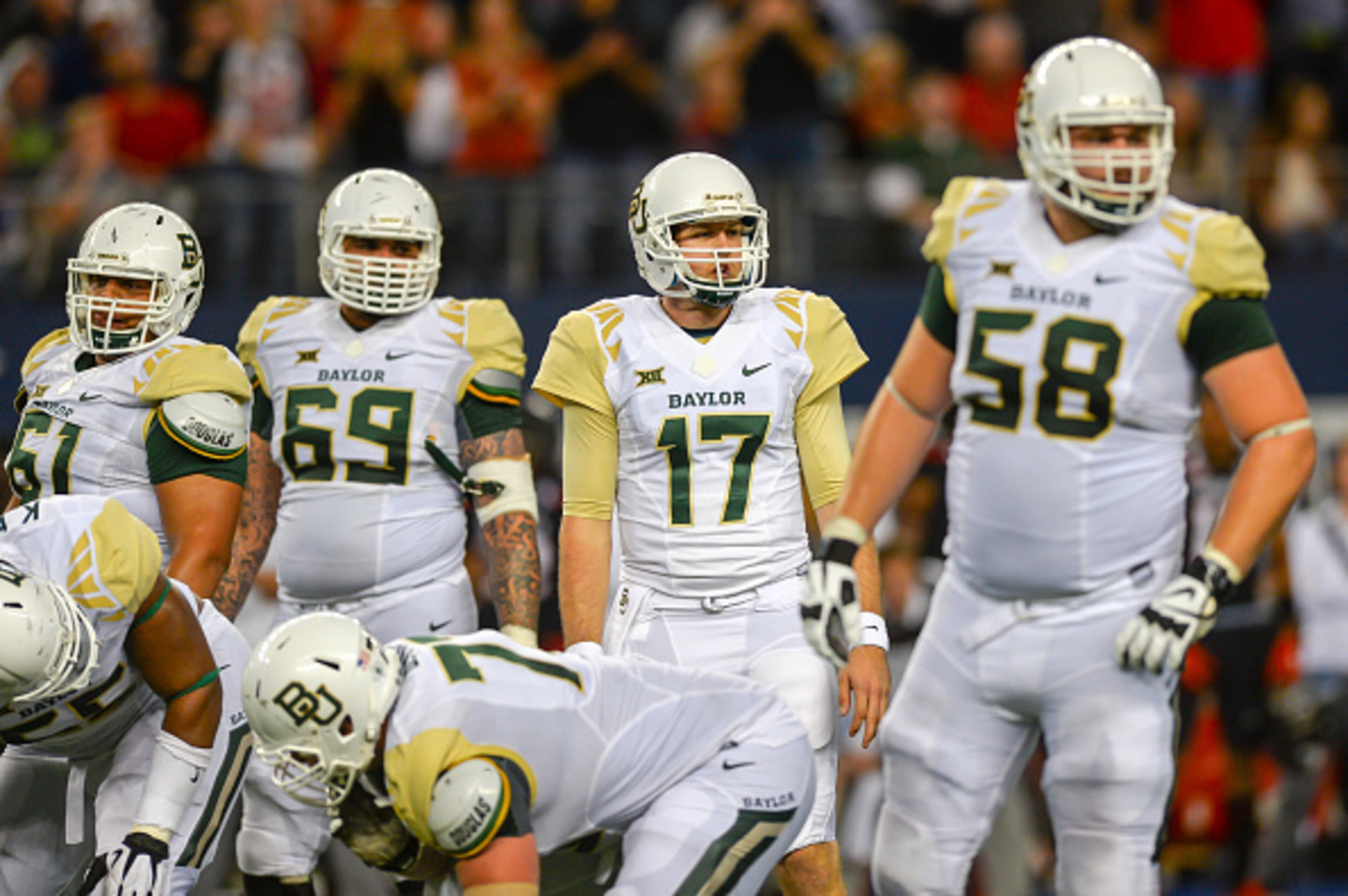 ARLINGTON, TX - NOVEMBER 29: Seth Russell #17 of the Baylor Bears at the line of scrimmage during the game against the Texas Tech Red Raiders on November 29, 2014 at AT&T Stadium in Arlington, Texas. Baylor won the game 48-46.(Photo by John Weast/Getty Im