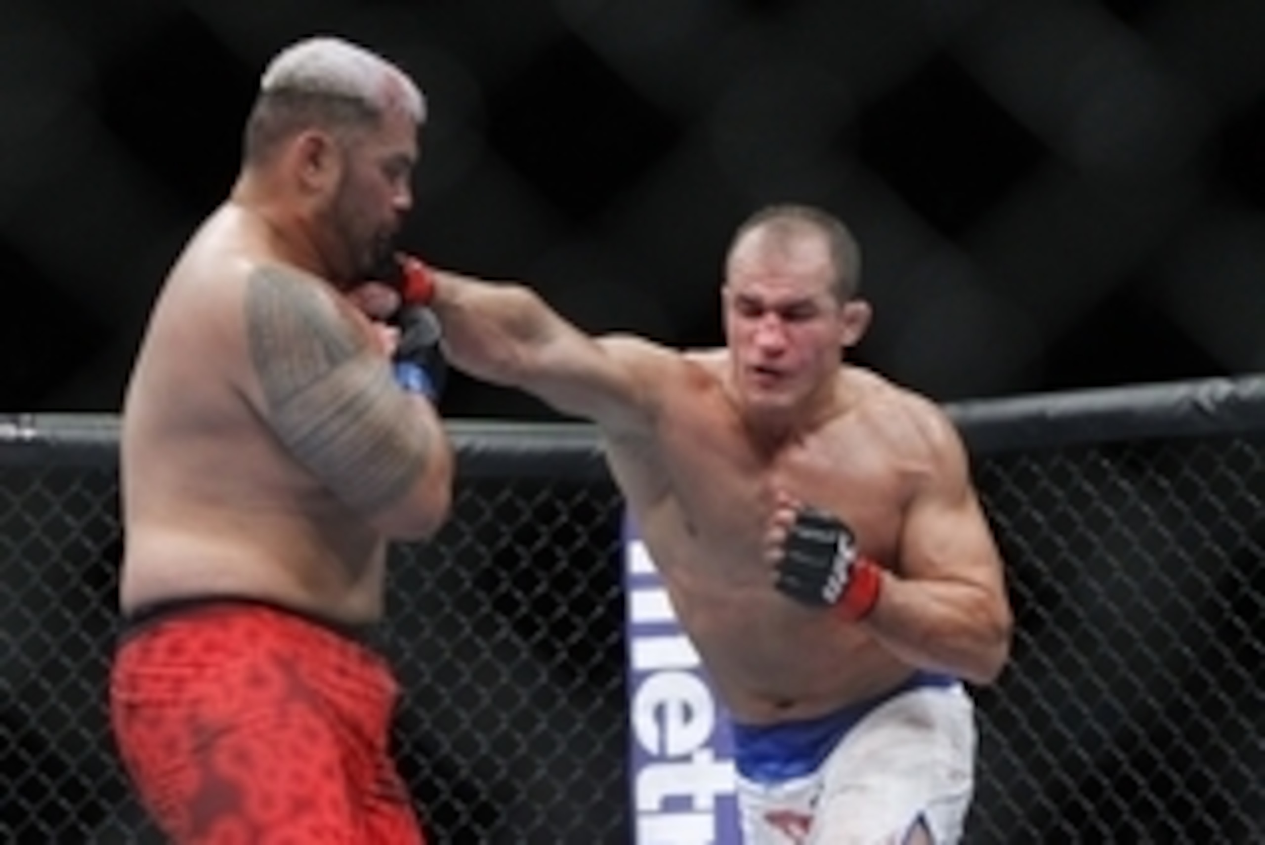 May 25, 2013; Las Vegas, NV, USA; Junior dos Santos lands a punch against Mark Hunt during UFC 160 at the MGM Grand Garden Arena. Mandatory Credit: Gary A. Vasquez-USA TODAY Sports