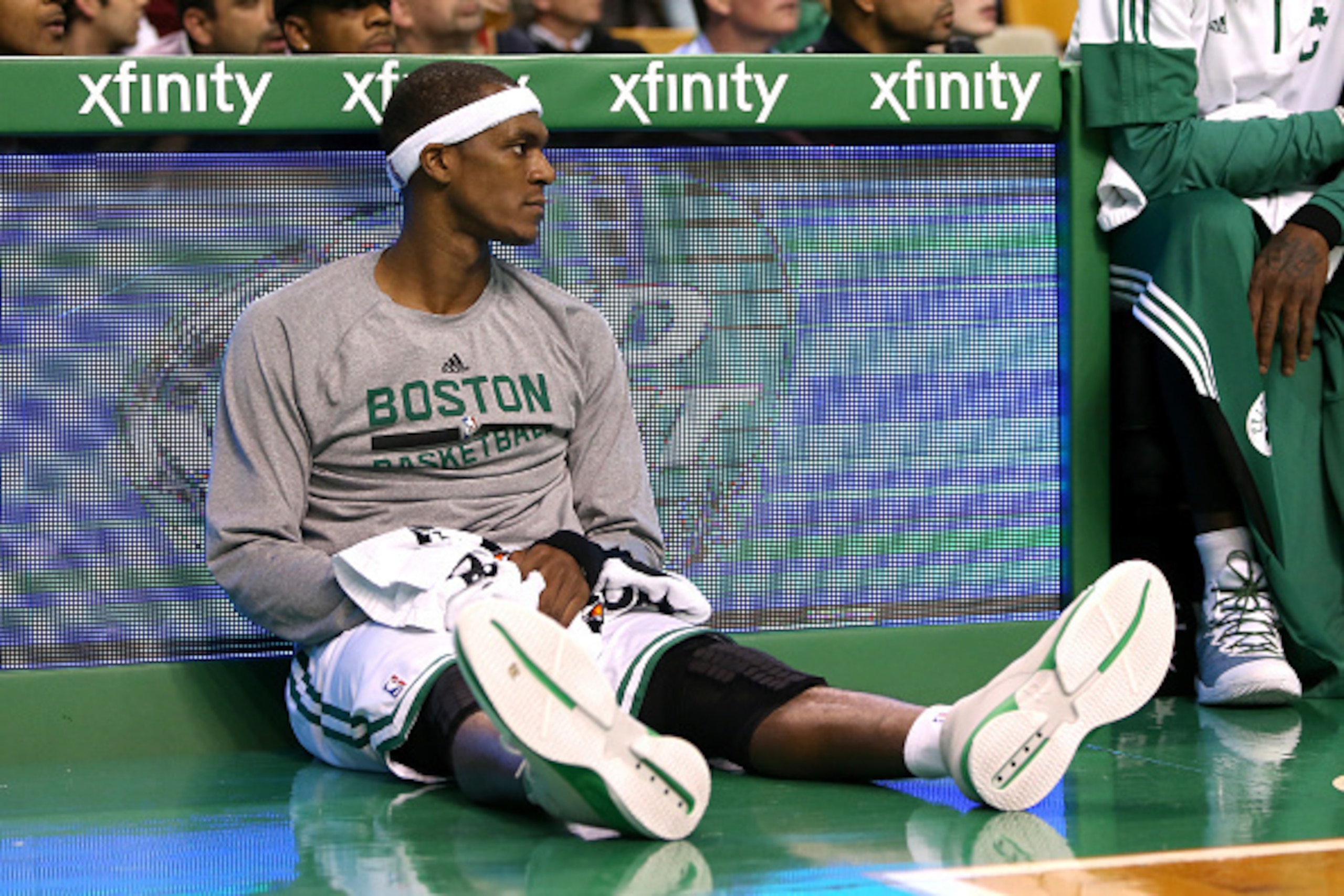 BOSTON, MA - NOVEMBER 14:  Rajon Rondo #9 of the Boston Celtics looks on from the bench against the Cleveland Cavaliers at TD Garden on November 14, 2014 in Boston, Massachusetts. NOTE TO USER: User expressly acknowledges and agrees that, by downloading a