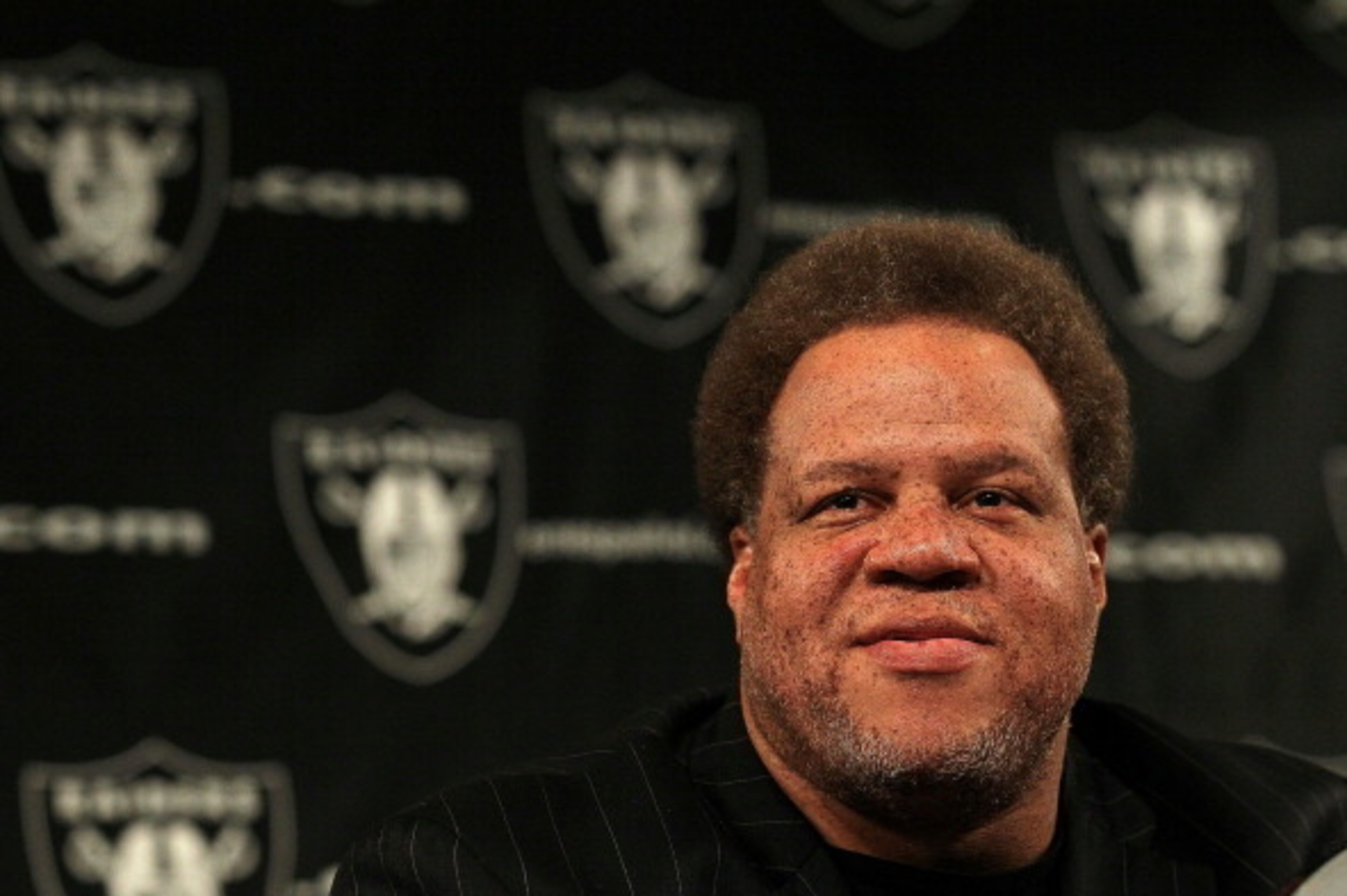 ALAMEDA, CA - JANUARY 30:  Raiders general manager Reggie McKenzie looks on during a press conference on January 30, 2012 in Alameda, California. Dennis Allen was introduced as the new coach of the Oakland Raiders, replacing Hue Jackson who was fired afte