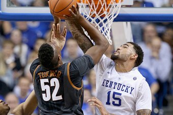 LEXINGTON, KY - DECEMBER 05:  Willie Cauley-Stein #15 of the Kentucky Wildcats blocks the shot of Myles Turner #52 of the Texas Longhorns at Rupp Arena on December 5, 2014 in Lexington, Kentucky.  (Photo by Andy Lyons/Getty Images)