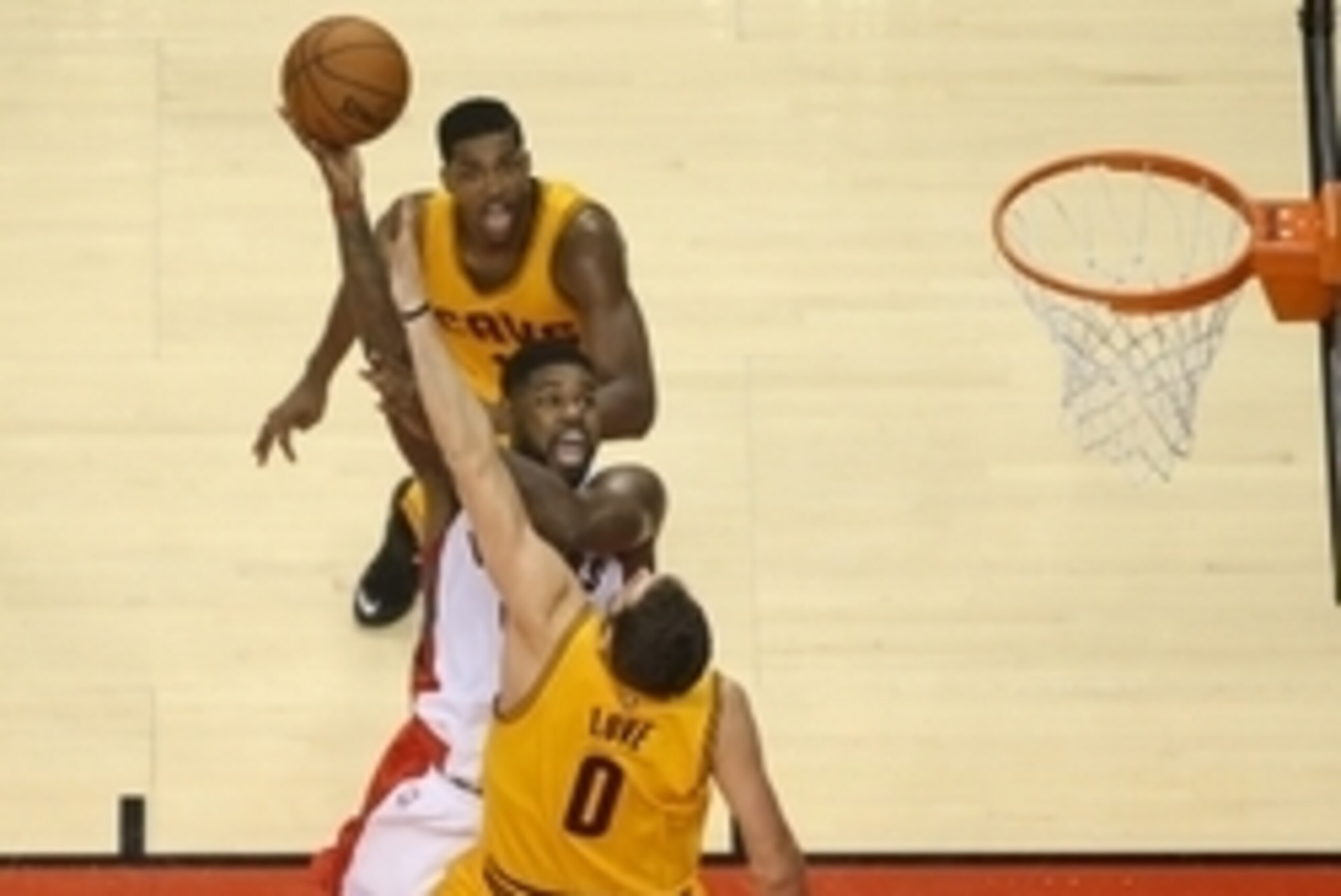 Dec 5, 2014; Toronto, Ontario, CAN; Toronto Raptors forward Amir Johnson (15) shoots the ball against the Cleveland Cavaliers at Air Canada Centre. The Cavaliers won105-91. Mandatory Credit: Tom Szczerbowski-USA TODAY Sports