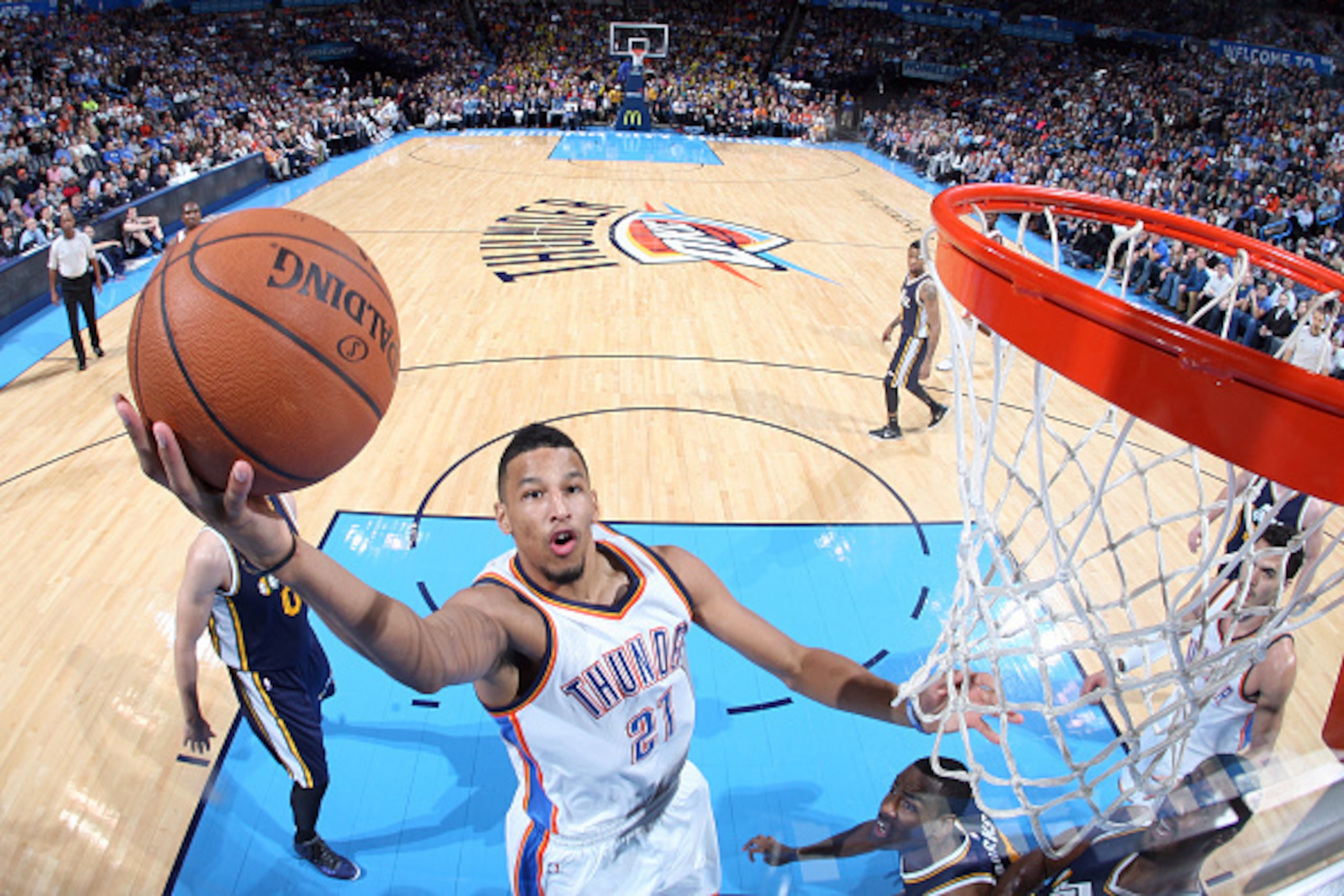 OKLAHOMA CITY, OK- NOVEMBER 26: Andre Roberson #21 of the Oklahoma City Thunder shoots against the Utah Jazz on November 26, 2014 at Chesapeake Energy Arena in Oklahoma City, OK. NOTE TO USER: User expressly acknowledges and agrees that, by downloading an