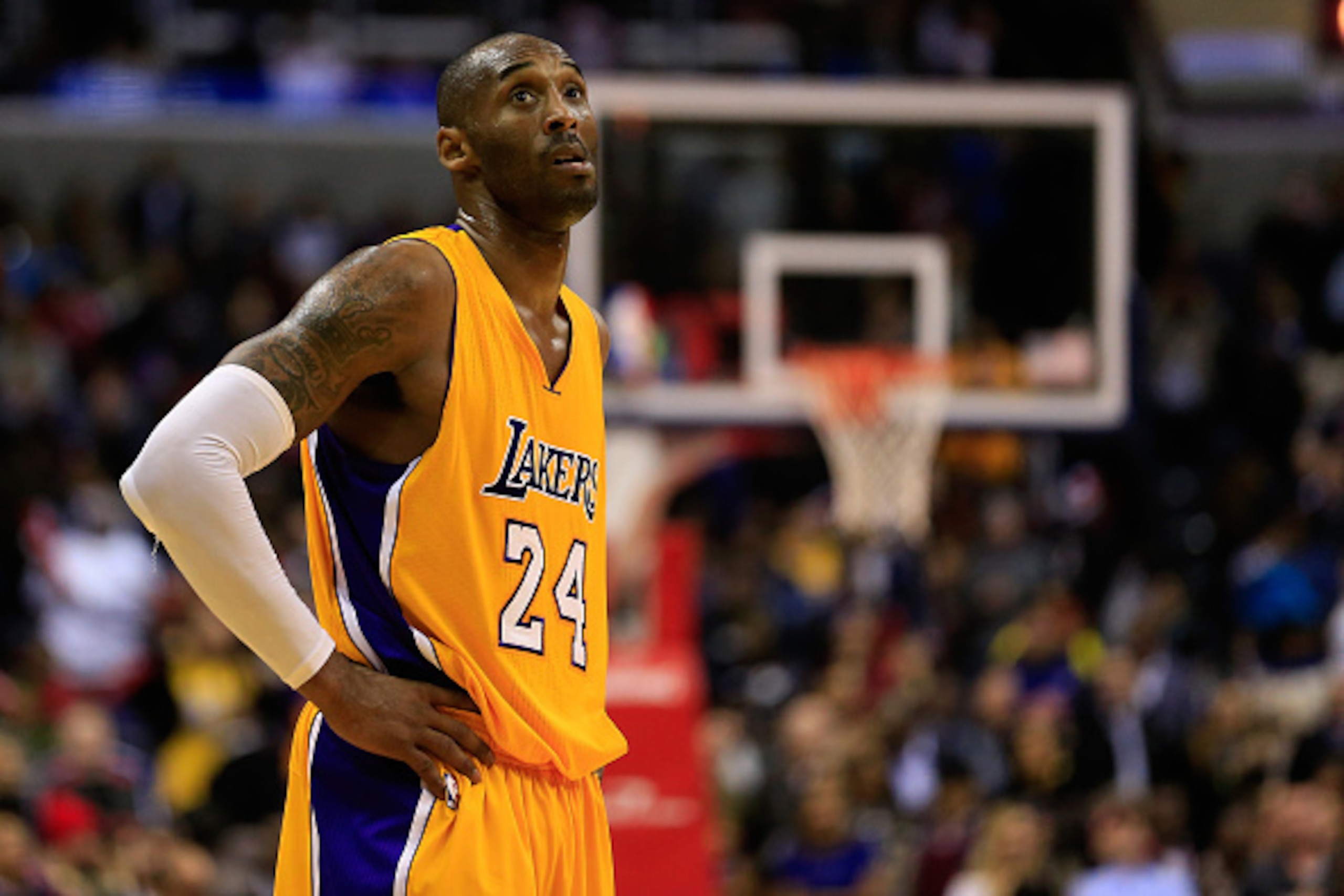 WASHINGTON, DC - DECEMBER 03: Kobe Bryant #24 of the Los Angeles Lakers looks on during the closing moments of the Lakers 11-95 loss to the Washington Wizards at Verizon Center on December 3, 2014 in Washington, DC. NOTE TO USER: User expressly acknowledg