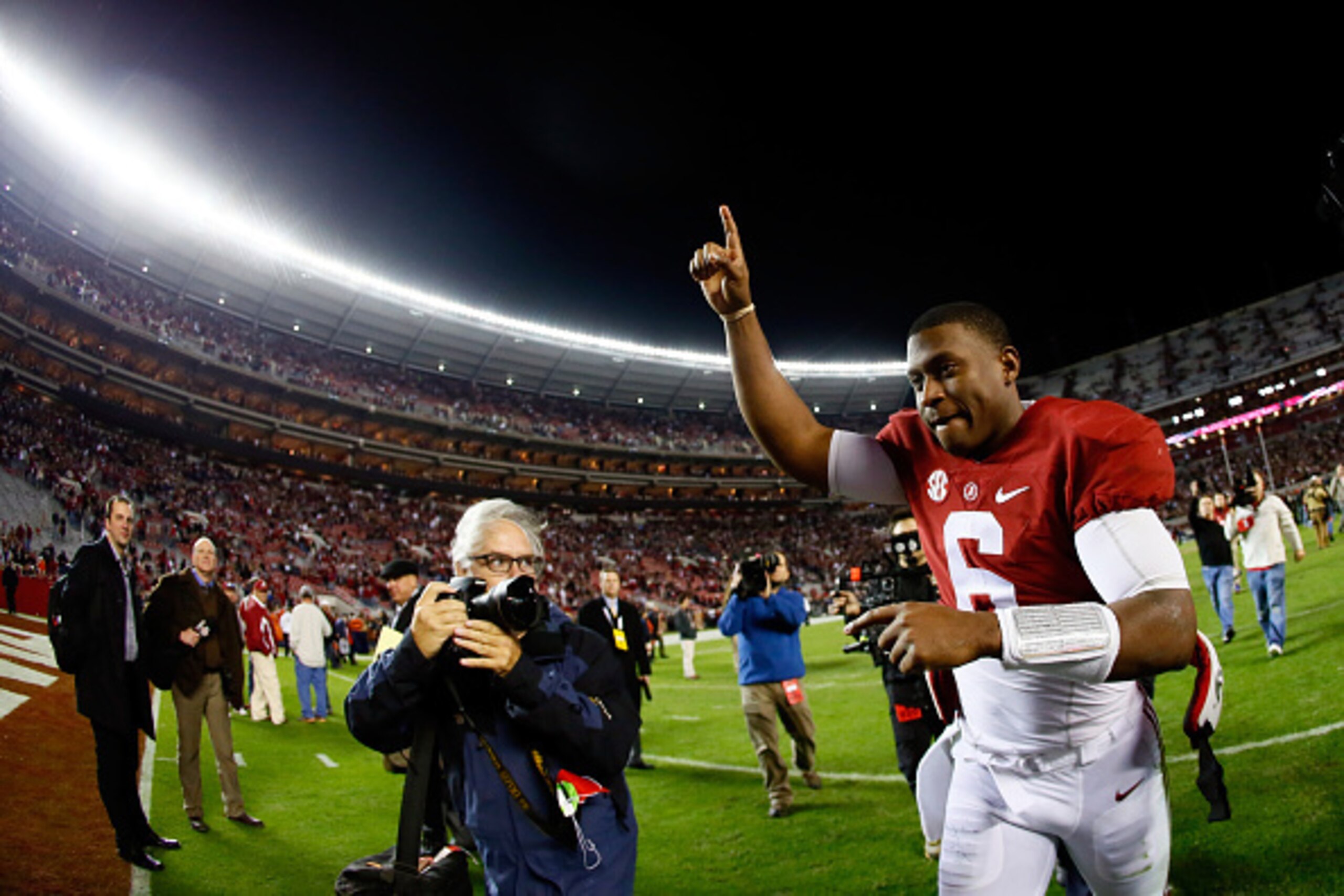 TUSCALOOSA, AL - NOVEMBER 29:  Blake Sims #6 of the Alabama Crimson Tide celebrates as he runs off the field after defeating the Auburn Tigers in the Iron Bowl at Bryant-Denny Stadium on November 29, 2014 in Tuscaloosa, Alabama. The Alabama Crimson Tide d