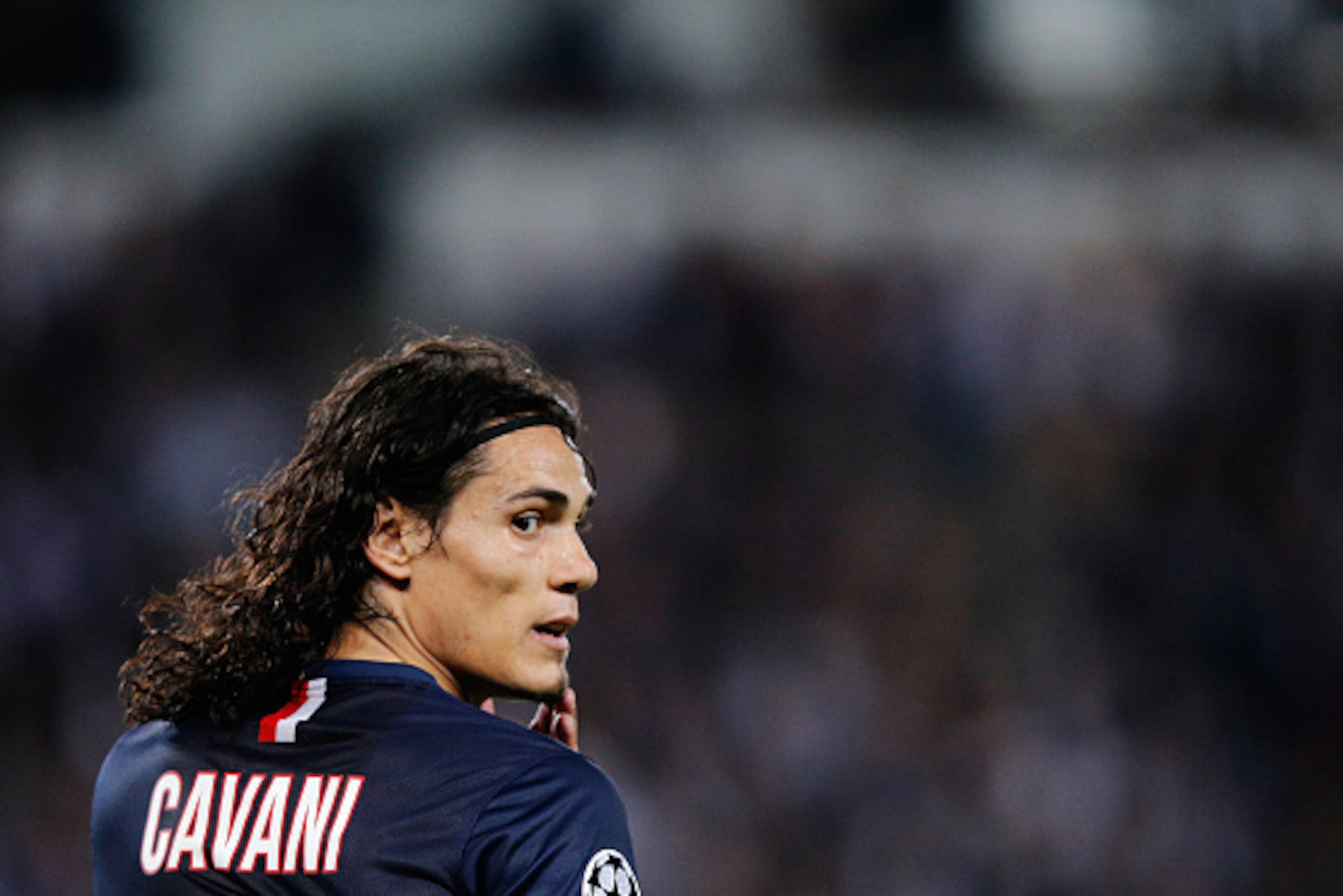 PARIS, FRANCE - SEPTEMBER 30:  Edinson Cavani of PSG waits for a corner to be taken during the Group F UEFA Champions League match between Paris Saint-Germain v FC Barcelona held at Parc des Princes on September 30, 2014 in Paris, France.  (Photo by Dean 