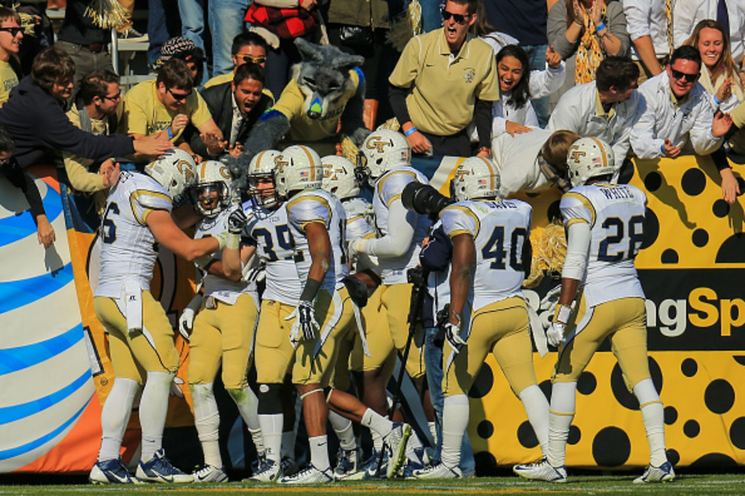 ATLANTA, GA - NOVEMBER 15: Chris Milton #6 of the Georgia Tech Yellow Jackets celebrates an interception and touchdown during the second half against the Clemson Tigers at Bobby Dodd Stadium on November 15, 2014 in Atlanta, Georgia. Georgia Tech won 28-6.