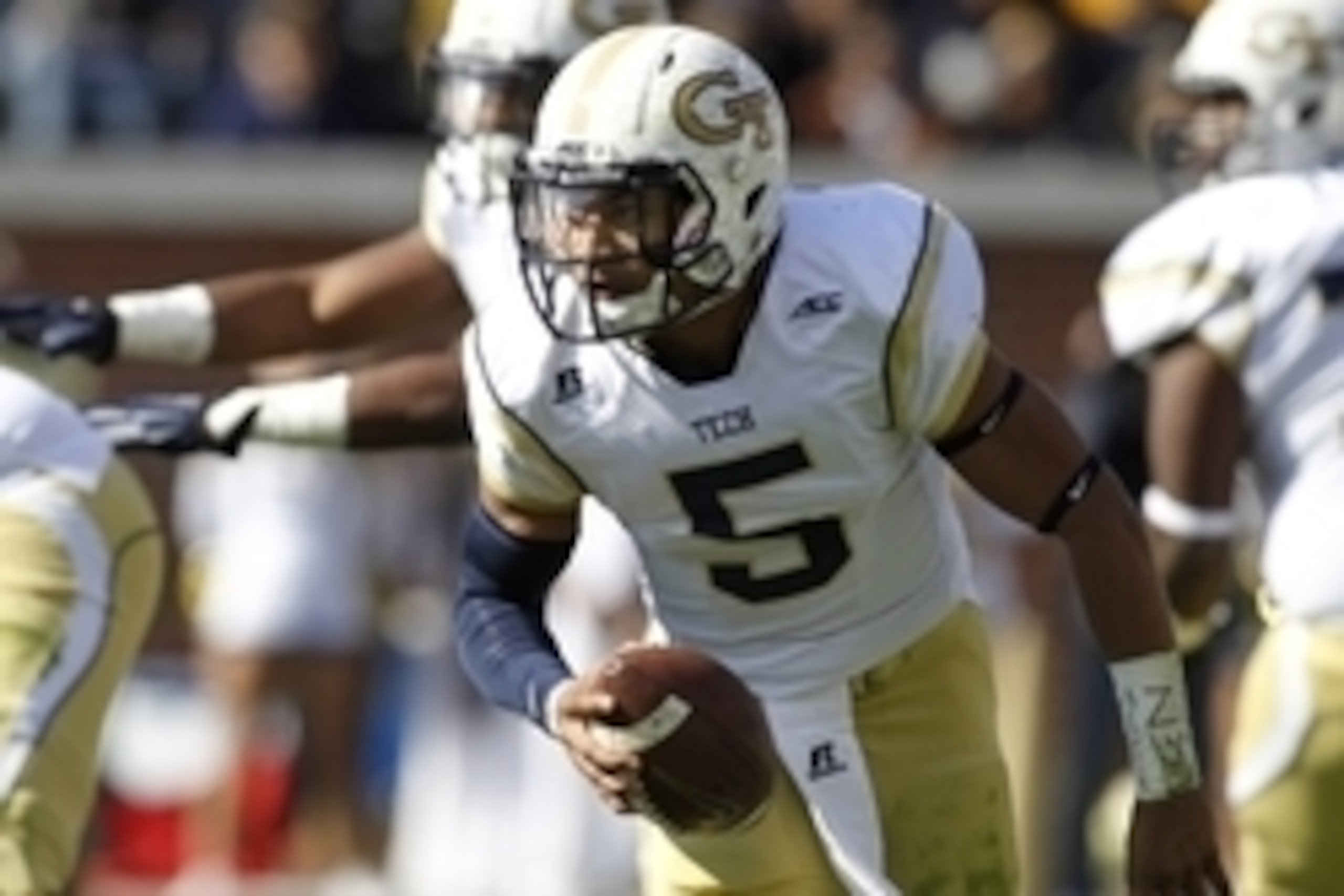 Nov 15, 2014; Atlanta, GA, USA; Georgia Tech Yellow Jackets quarterback Justin Thomas (5) runs with the ball against the Clemson Tigers in the first quarter at Bobby Dodd Stadium. Mandatory Credit: Brett Davis-USA TODAY Sports