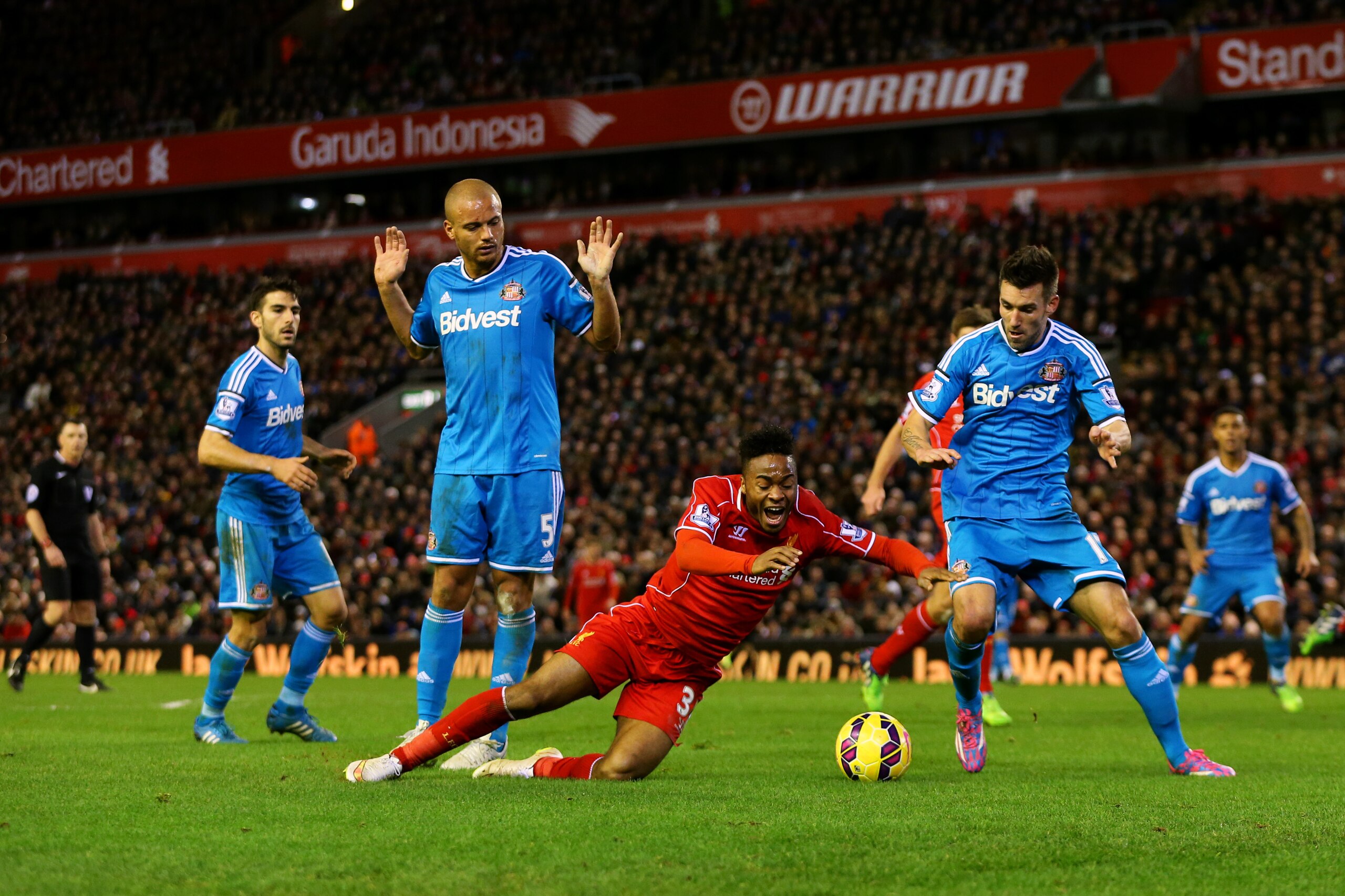 LIVERPOOL, ENGLAND - DECEMBER 06:  Raheem Sterling of Liverpool goes down in the penalty area during the Barclays Premier League match between Liverpool and Sunderland at Anfield on December 6, 2014 in Liverpool, England.  (Photo by Scott Heavey/Getty Ima