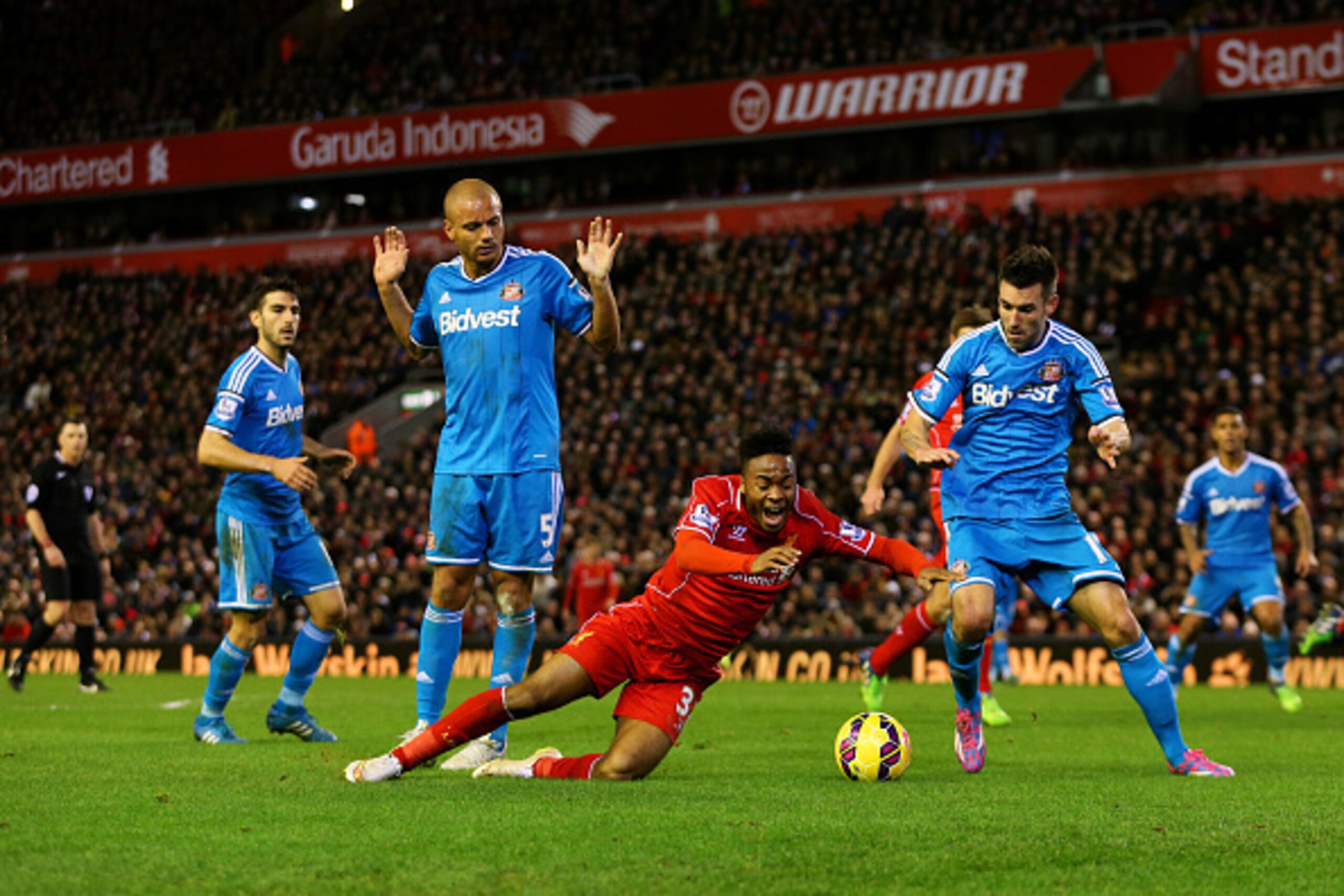 LIVERPOOL, ENGLAND - DECEMBER 06:  Raheem Sterling of Liverpool goes down in the penalty area during the Barclays Premier League match between Liverpool and Sunderland at Anfield on December 6, 2014 in Liverpool, England.  (Photo by Scott Heavey/Getty Ima
