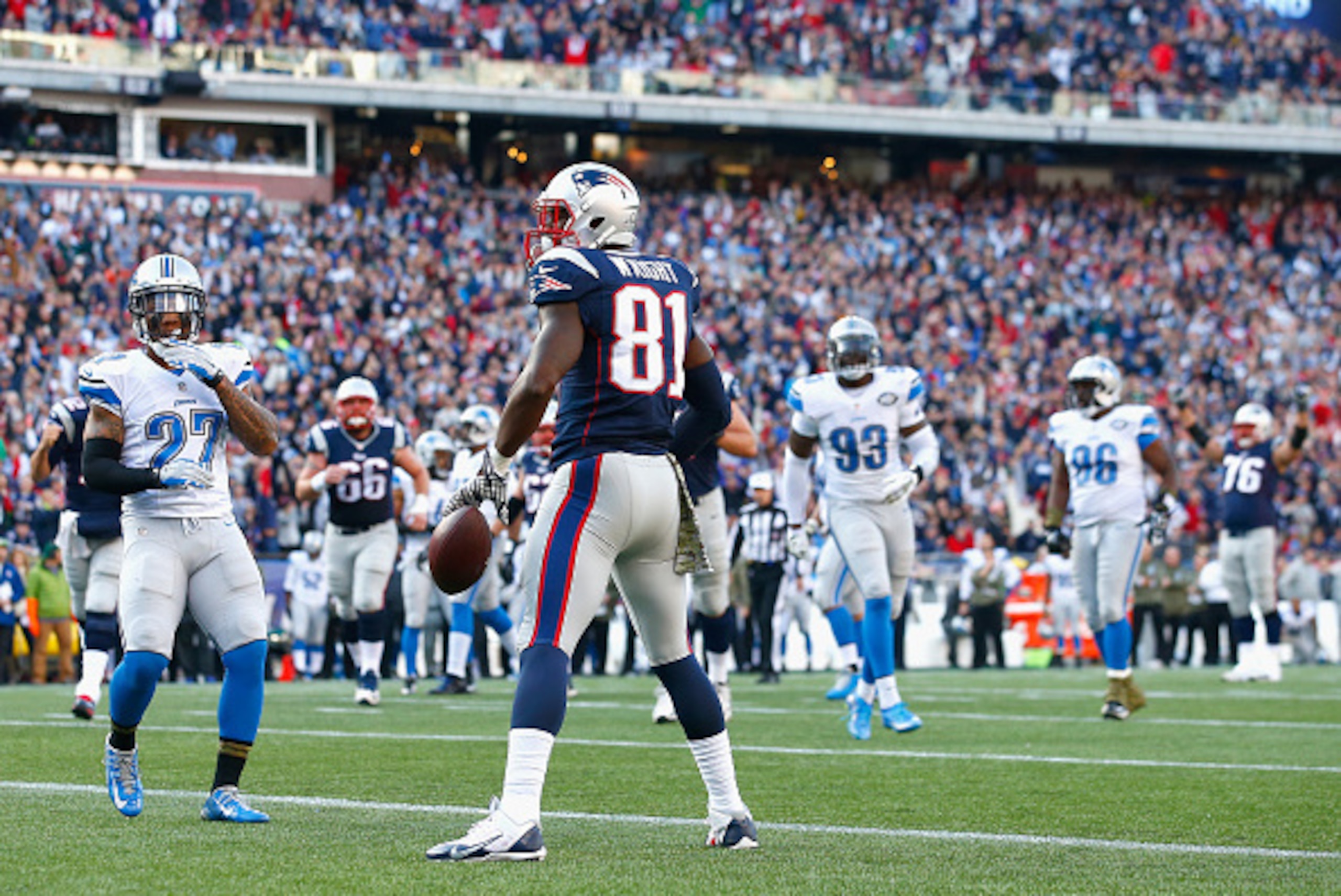 FOXBORO, MA - NOVEMBER 23:  Tim Wright #81 of the New England Patriots reacts after scoring a touchdown during the second quarter against the Detroit Lions at Gillette Stadium on November 23, 2014 in Foxboro, Massachusetts.  (Photo by Jared Wickerham/Gett