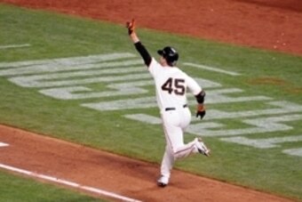 Oct 16, 2014; San Francisco, CA, USA; San Francisco Giants left fielder Travis Ishikawa (45) celebrates hitting a walk off three run home run against the St. Louis Cardinals during the ninth inning of game five of the 2014 NLCS playoff at AT&T Park. Giant